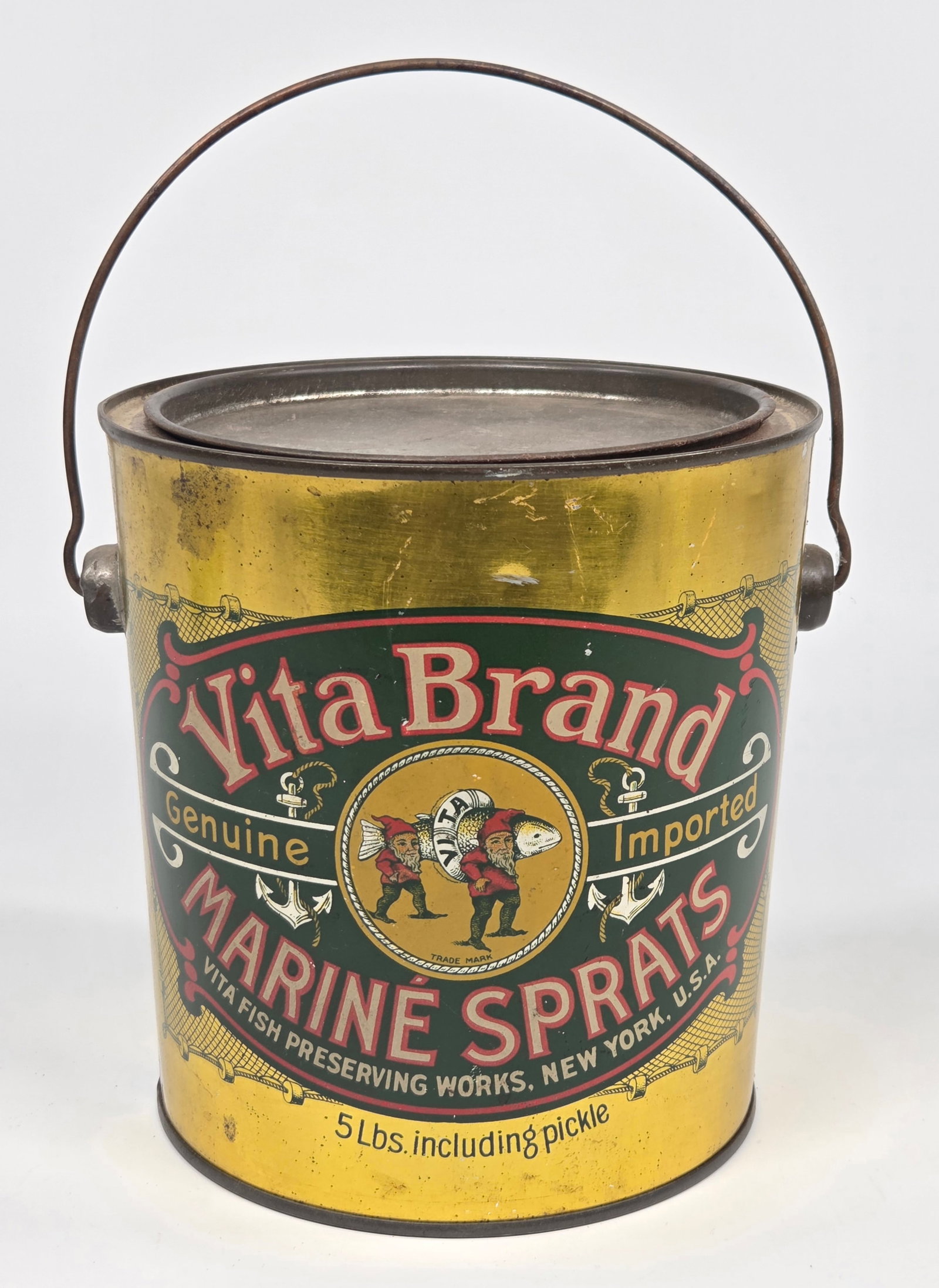 VITA BRAND MARINE SPRATS 5 POUND TIN W/ HANDLE: REMAINS IN GOOD CONDITION, SHOWING SOME TYPICAL WEAR.