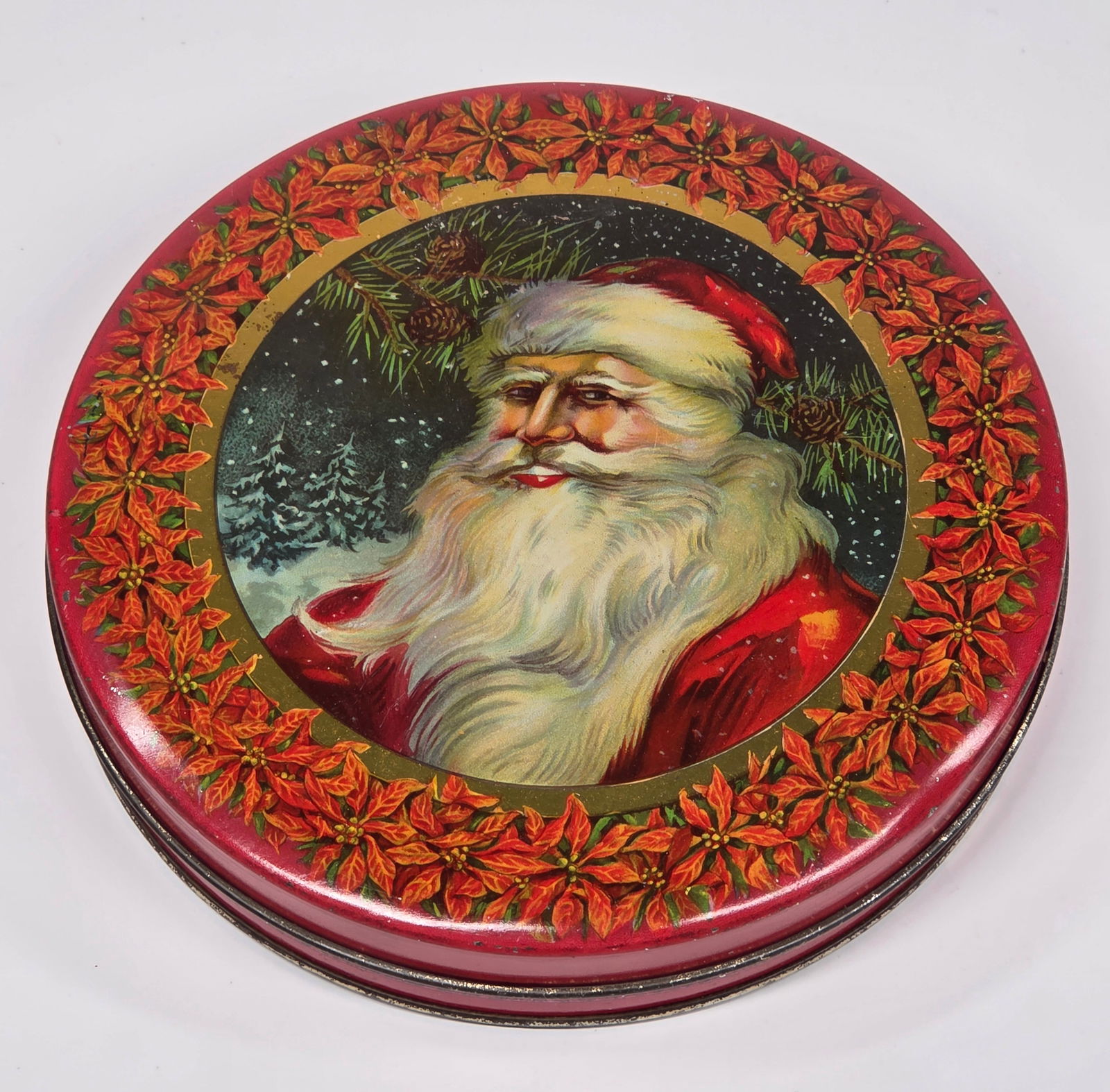 ANTIQUE LARGE SIZE SANTA CLAUS COOKIE TIN: SMALL DENT ALONG EDGE, OTHERWISE REMAINS IN GOOD CONDITION. SHOWING SOME TYPICAL WEAR.