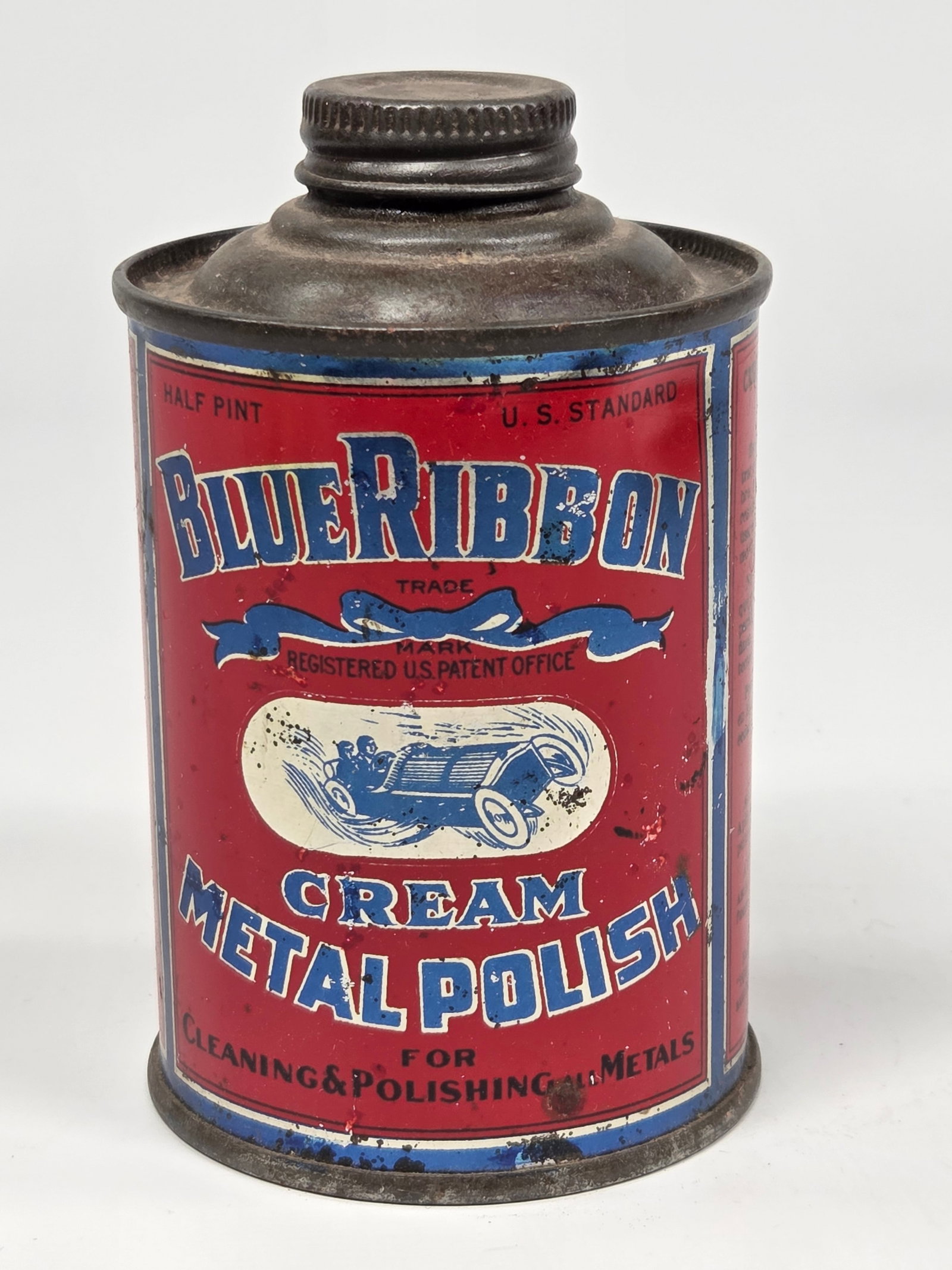 EARLY AUTOMOBILE BLUE RIBBON CREAM METAL POLISH TIN: REMAINS IN GOOD CONDITION, SHOWING SOME TYPICAL WEAR.