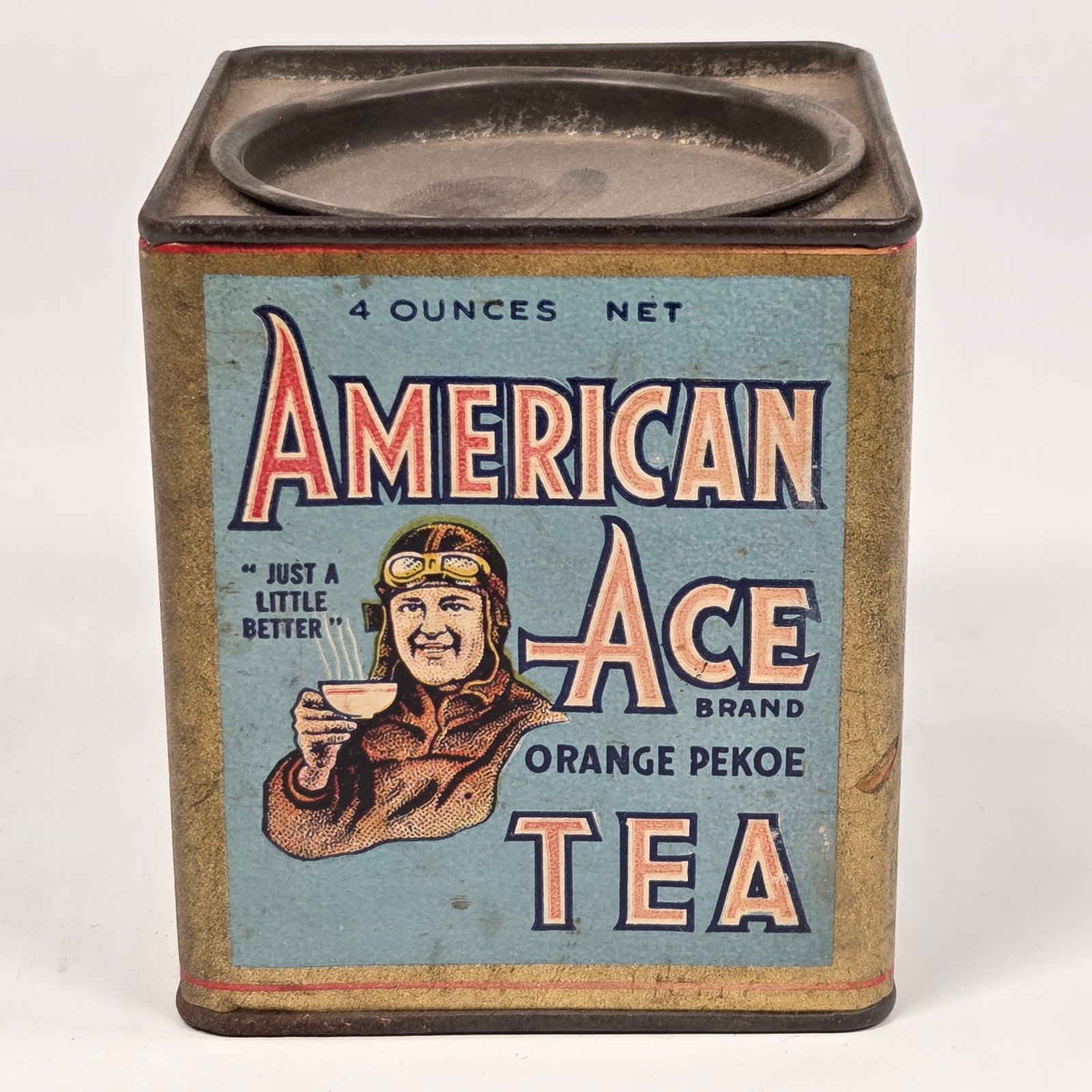 AMERICAN ACE PILOT ORANGE PEKOE TEA 4OZ. TIN: REMAINS IN GOOD CONDITION, SHOWING SOME TYPICAL WEAR.
