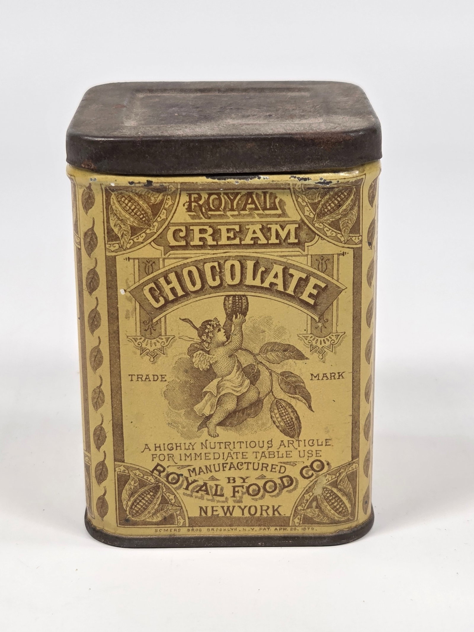 ROYAL FOOD CO. ROYAL CREAM CHOCOLATE TIN: REMAINS IN GOOD CONDITION, SHOWING SOME TYPICAL WEAR.