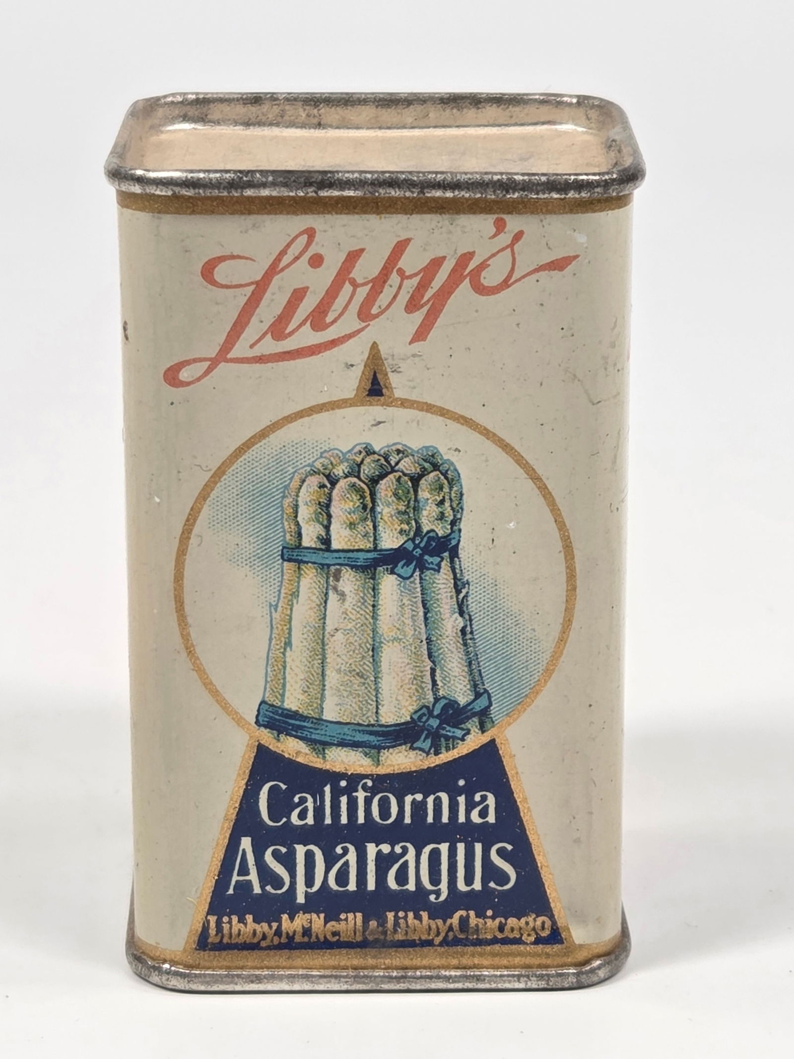 MINIATURE LIBBY'S CALIFORNIA ASPARAGUS TIN: REMAINS IN GOOD CONDITION, SHOWING SOME TYPICAL WEAR.