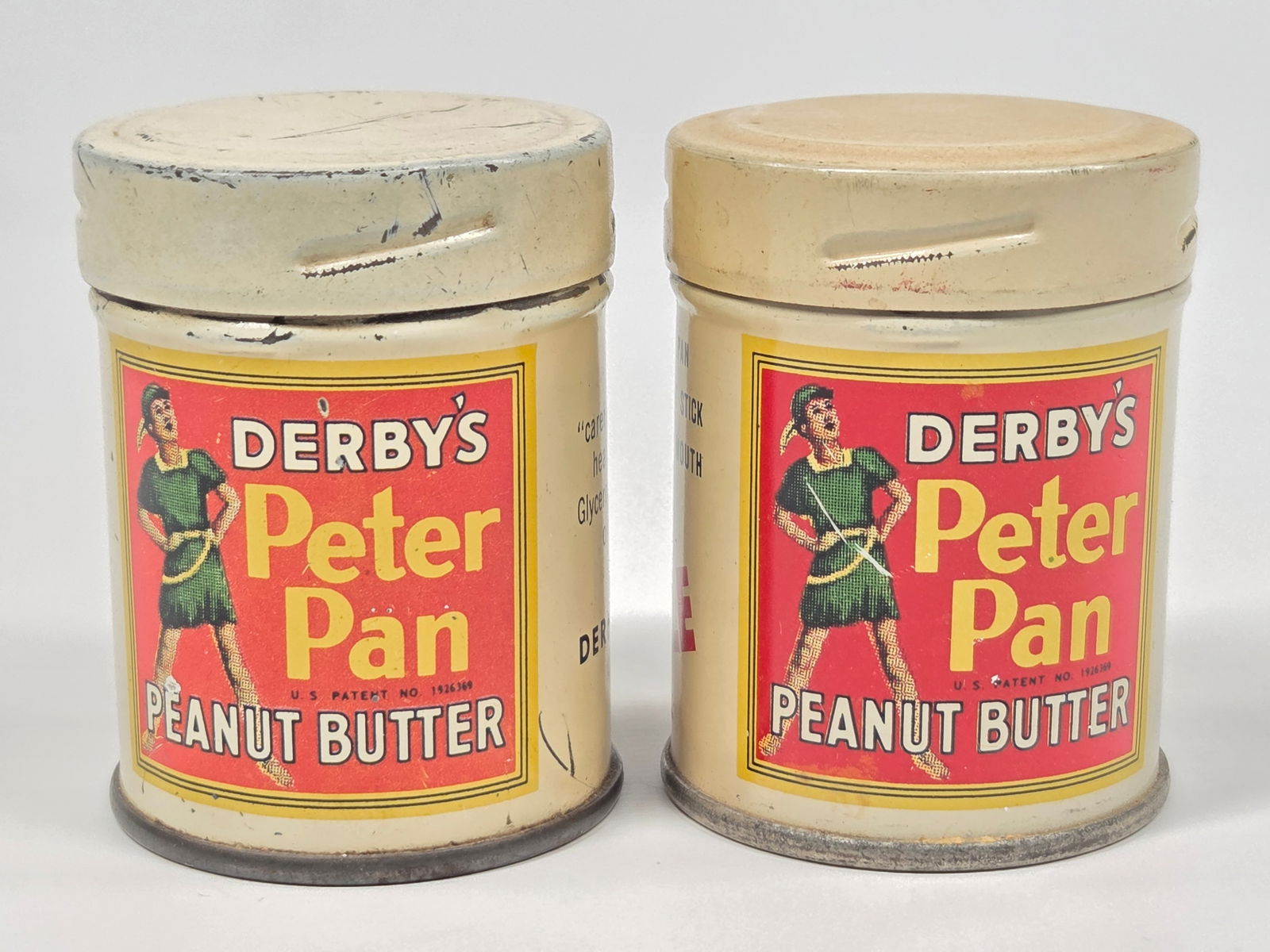 2) DERBY'S PETER PAN PEANUT BUTTER 2 OZ. SAMPLE TINS: BOTH REMAIN IN GOOD CONDITION, SHOWING SOME TYPICAL WEAR. ONE FULL UNOPENED, THE OTHER EMPTY.
