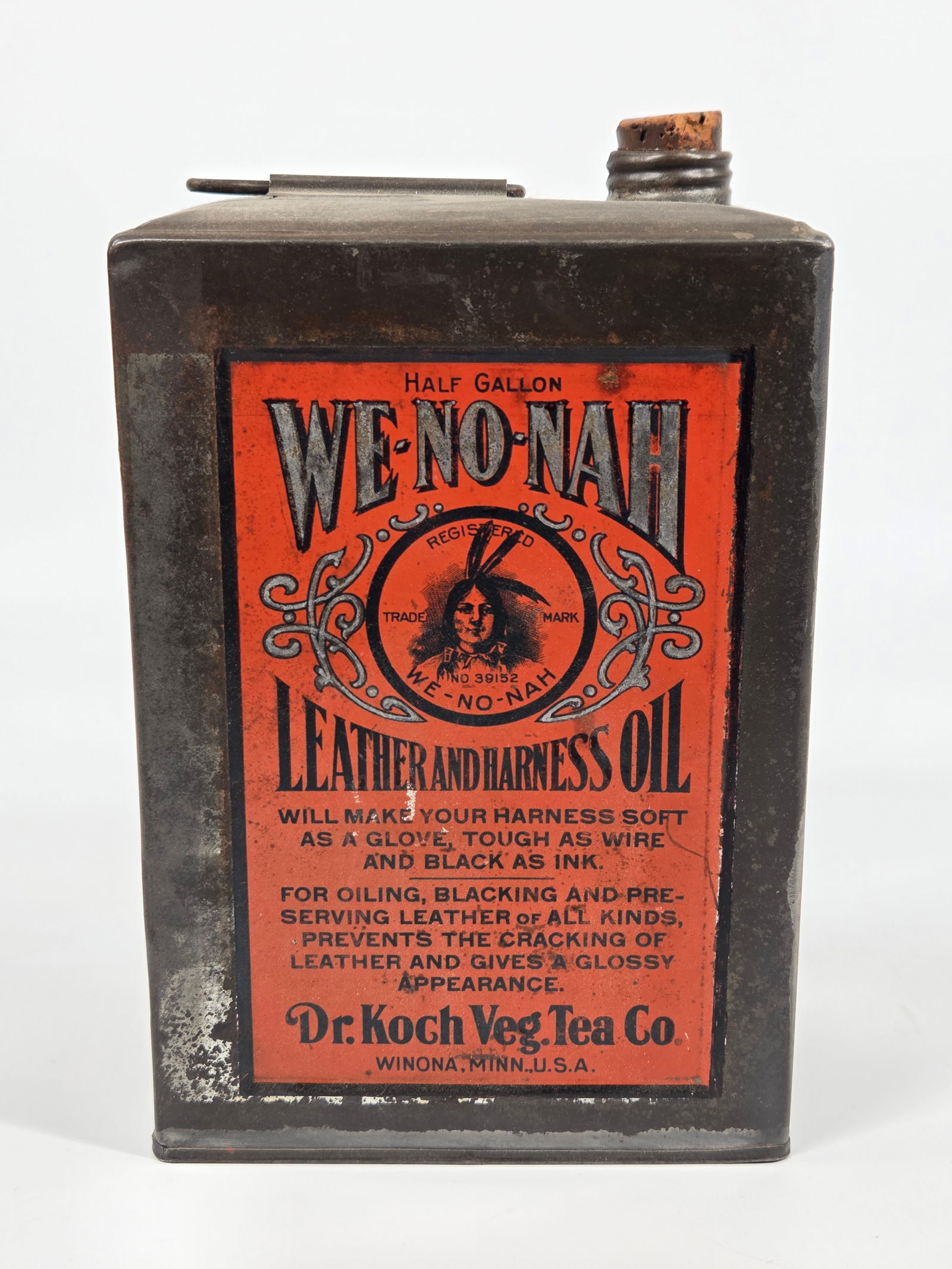 DR. KOCH VEG. TEA CO. WE NO NAH LEATHER & HARNESS OIL: FRONT PAPER LABEL REMAINS IN GOOD CONDITION. OTHER LABELS SHOWING WEAR. HALF GALLON TIN REMAINS IN GOOD CONDITION.