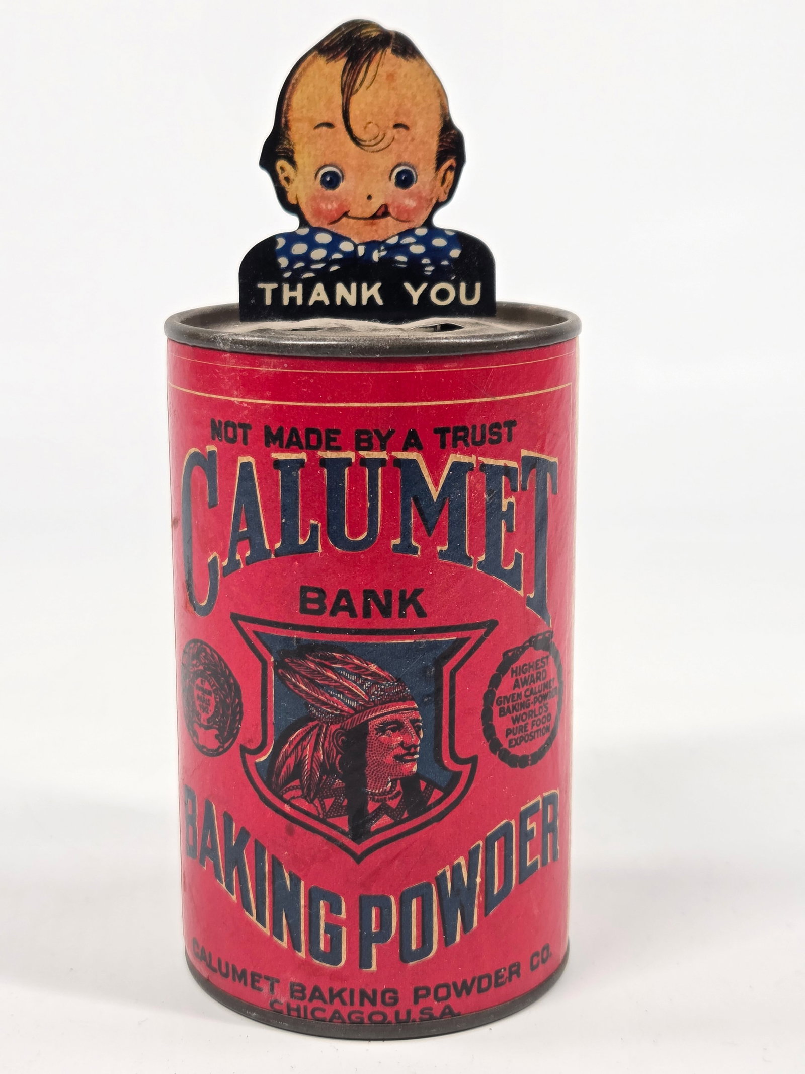 CALUMET BAKING POWDER MECHANICAL ADVERTISING BANK: REMAINS IN GOOD CONDITION, SHOWING SOME TYPICAL WEAR.