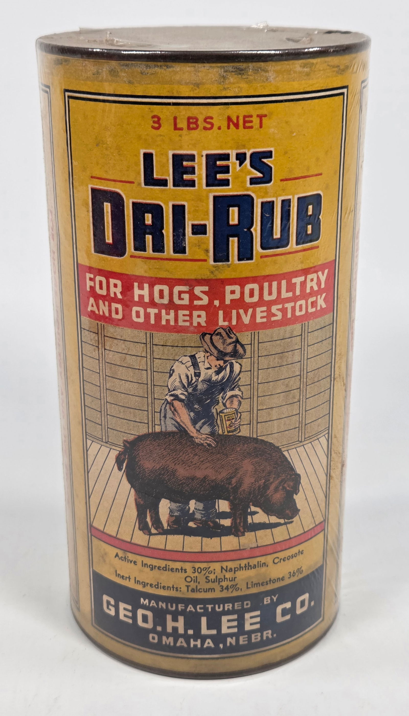 GEO. H. LEE CO. DRI-RUB FOR HOGS LIVESTOCK CONTAINER: REMAINS IN GOOD UNOPENED CONDITION. NICE PIG AND FARMER IMAGE. PLASTIC WRAPPED TO FOR PROTECTION.