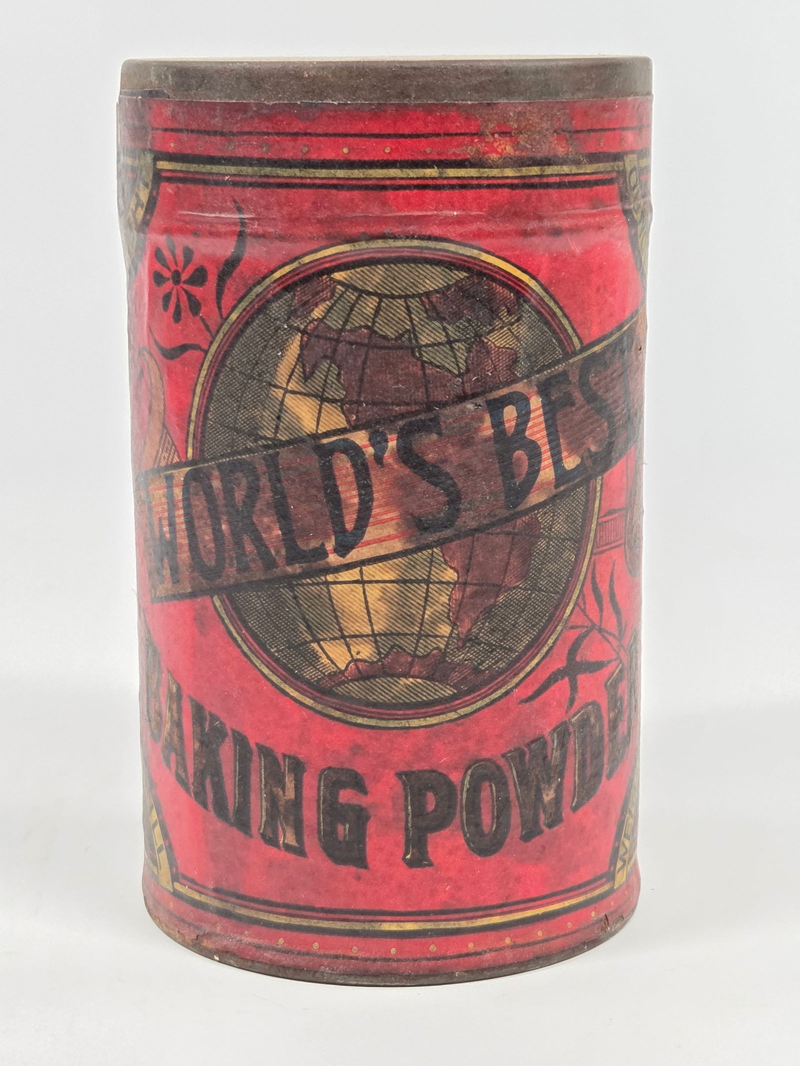 A.O. TILLINGHAST, AGT WORLD'S BEST BAKING POWDER CONTAINER: REMAINS IN GOOD UNOPENED CONDITION. PAPER LABEL SHOWING SOME WEAR AND SOME STAINING.