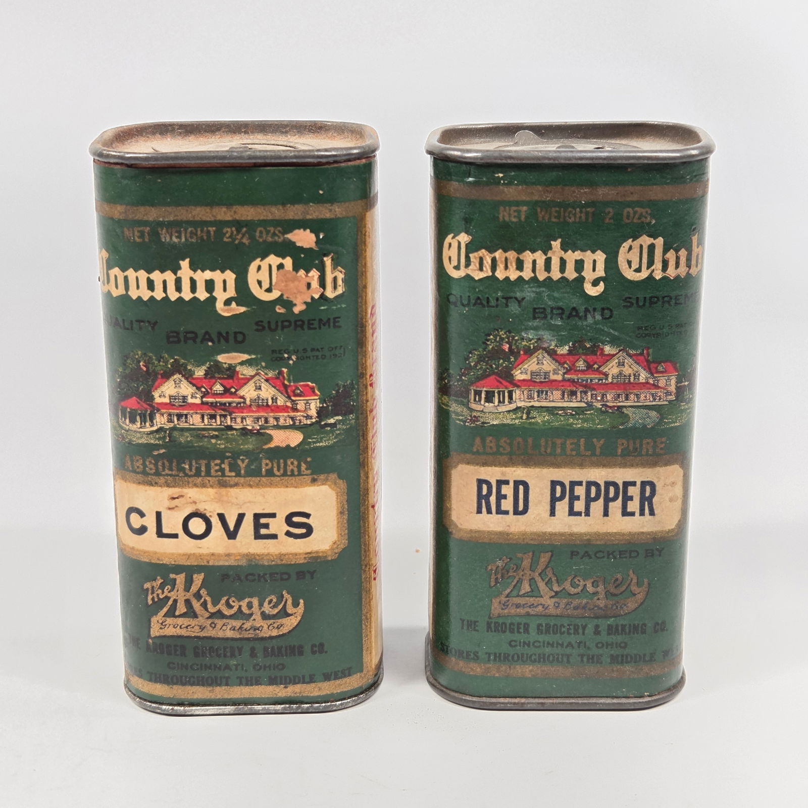 THE KROGER COUNTRY CLUB CLOVES & RED PEPPER SPICE TINS: PAPER LABELS REMAIN IN GOOD CONDITION, SHOWING SOME WEAR. TINS REMAINS IN GOOD CONDITION, SHOWING SOME TYPICAL WEAR.