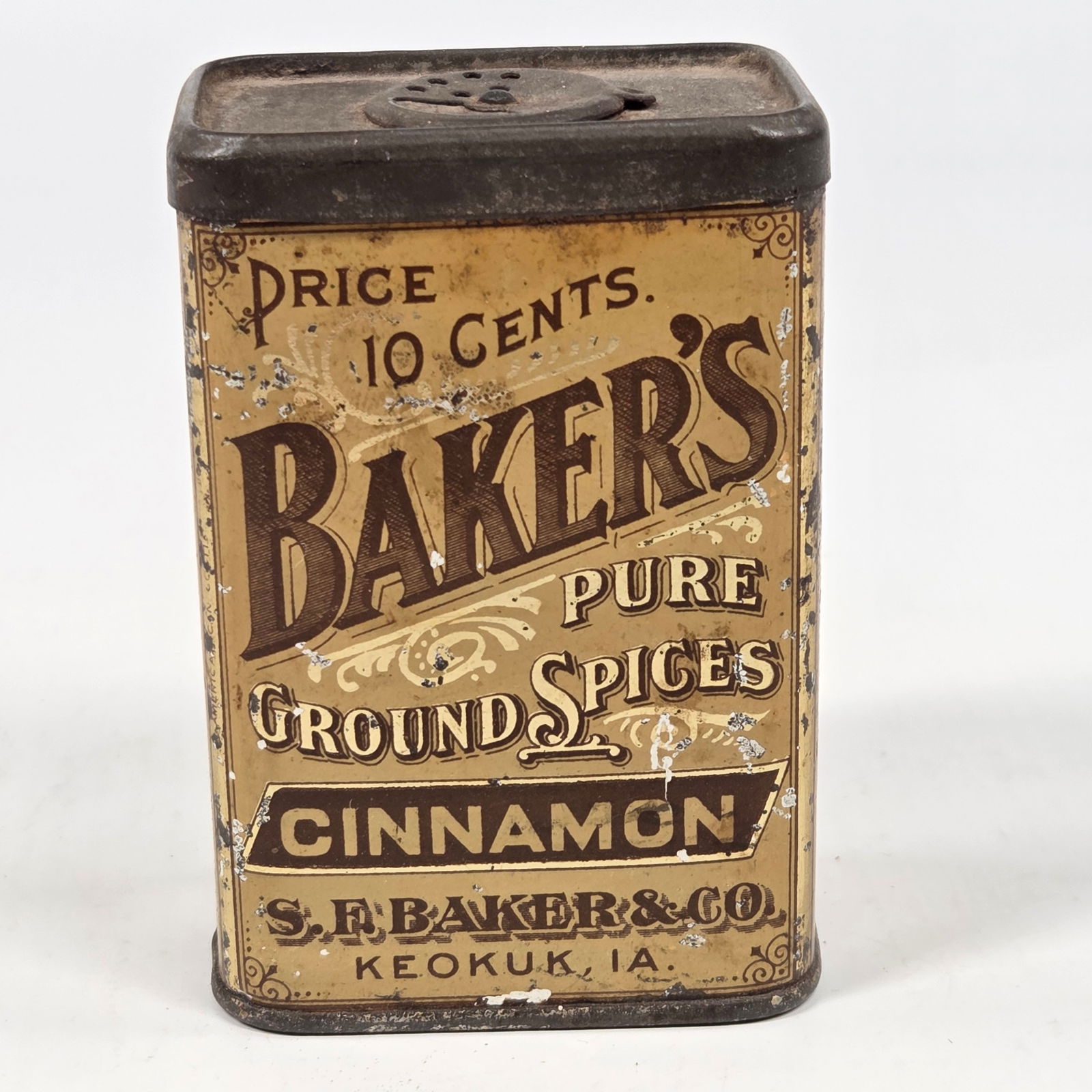 S.F. BAKER & CO. CINNAMON SPICE TIN: REMAINS IN FAIR TO GOOD CONDITION, SHOWING SOME TYPICAL WEAR.