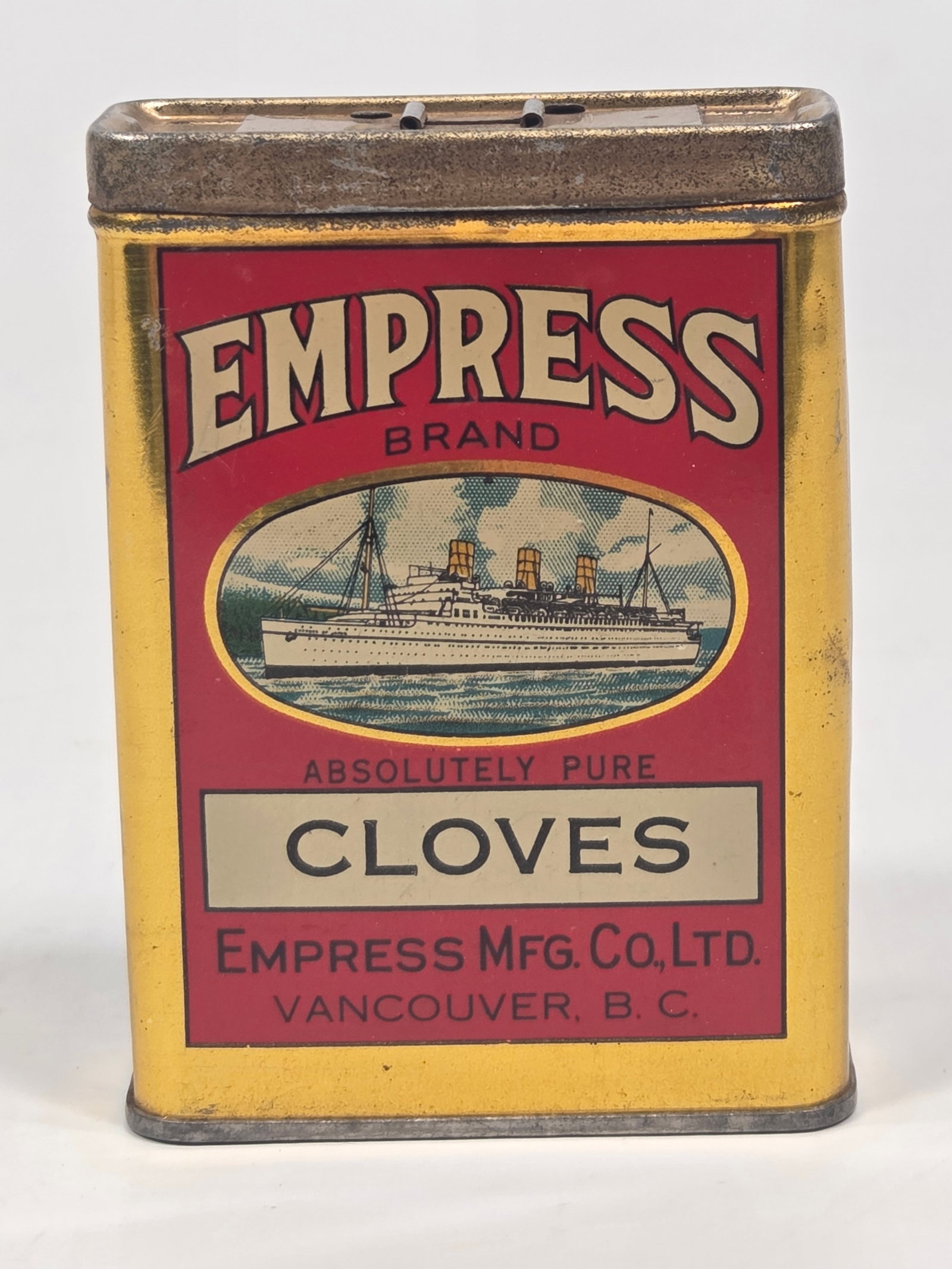 EMPRESS BRAND MFG. CO. LTD. CLOVES SPICE TIN: REMAINS IN GOOD CONDITION, SHOWING SOME TYPICAL WEAR.