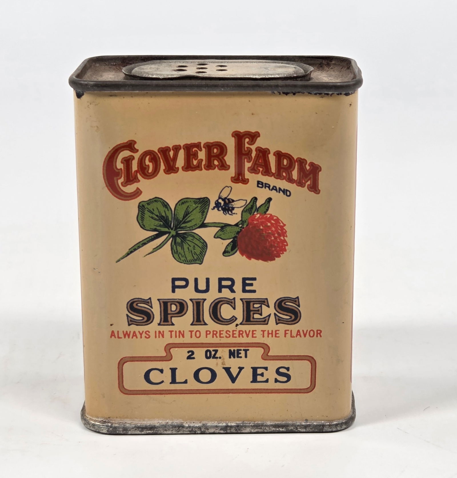 CLOVER FARM 2 OZ. CLOVES SPICE TIN: REMAINS IN GOOD CONDITION, SHOWING SOME TYPICAL WEAR.