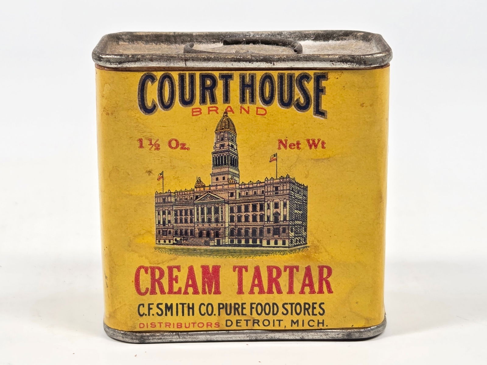 C.F. SMITH & CO COURTHOUSE BRAND CREAM TARTAR TIN: REMAINS IN GOOD CONDITION, SHOWING SOME TYPICAL WEAR. PAPER LABEL REMAINS NICE.