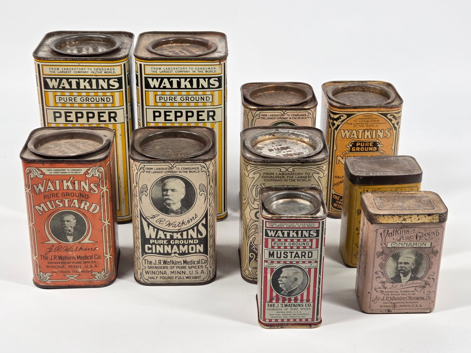 10) J.R. WATKINS MEDICAL CO. SPICE TINS: ALL REMAIN IN GOOD CONDITION, SHOWING SOME TYPICAL WEAR.
