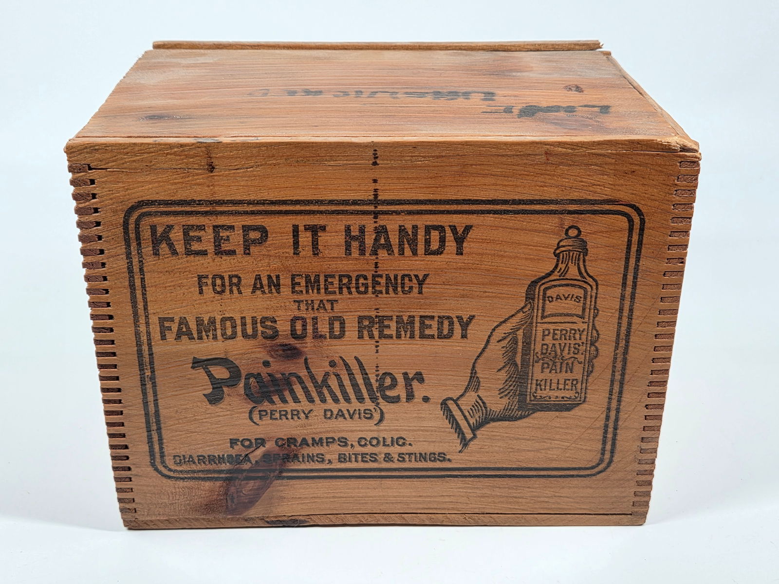 PERRY DAVIS PAINKILLER COUNTRY STORE WOOD BOX: REMAINS IN GOOD CONDITION, SHOWING SOME TYPICAL WEAR. BOX HAS BEEN SHELLACKED.