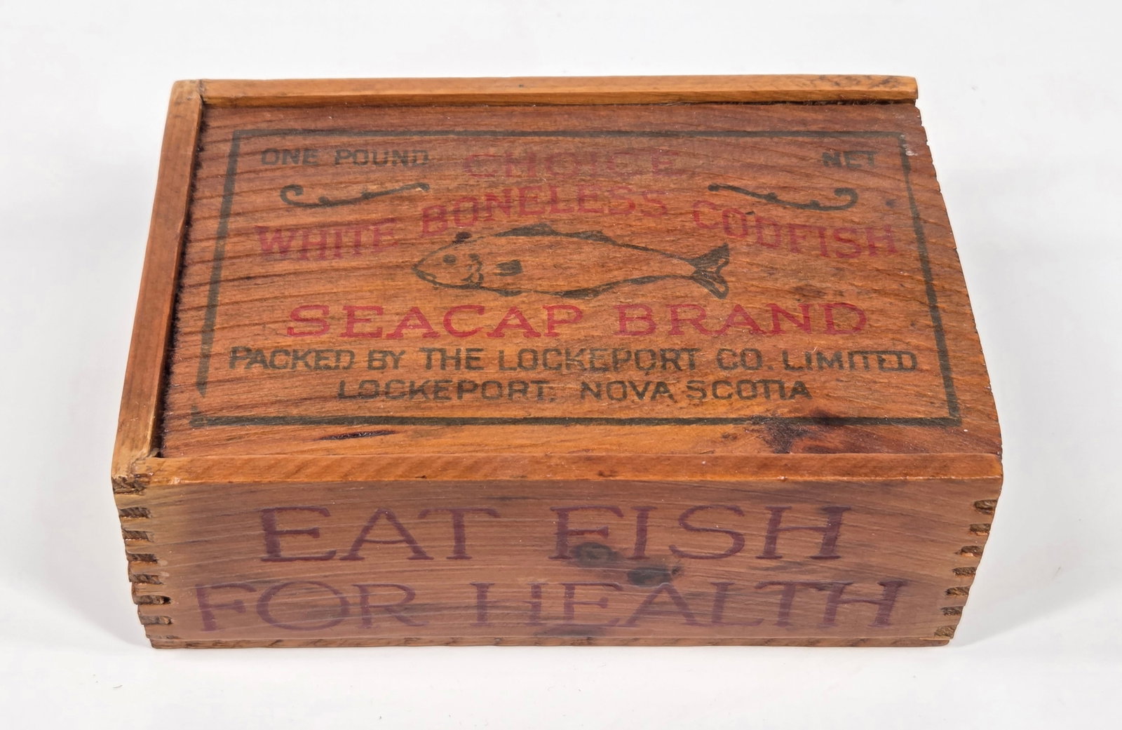SEACAP BRAND WHITE BONELESS CODFISH WOOD BOX: REMAINS IN GOOD ORIGINAL CONDITION, SHOWING SOME TYPICAL WEAR.