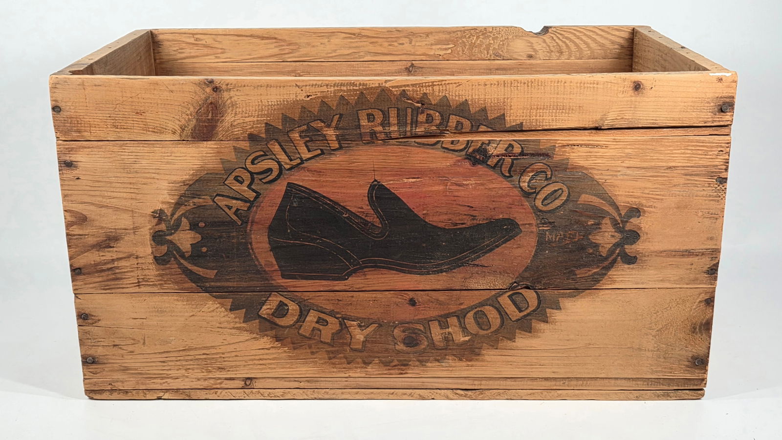 APSLEY RUBBER CO. DRY SHOD WOOD STORE BOX: REMAINS IN GOOD ORIGINAL CONDITION, SHOWING SOME TYPICAL WEAR.