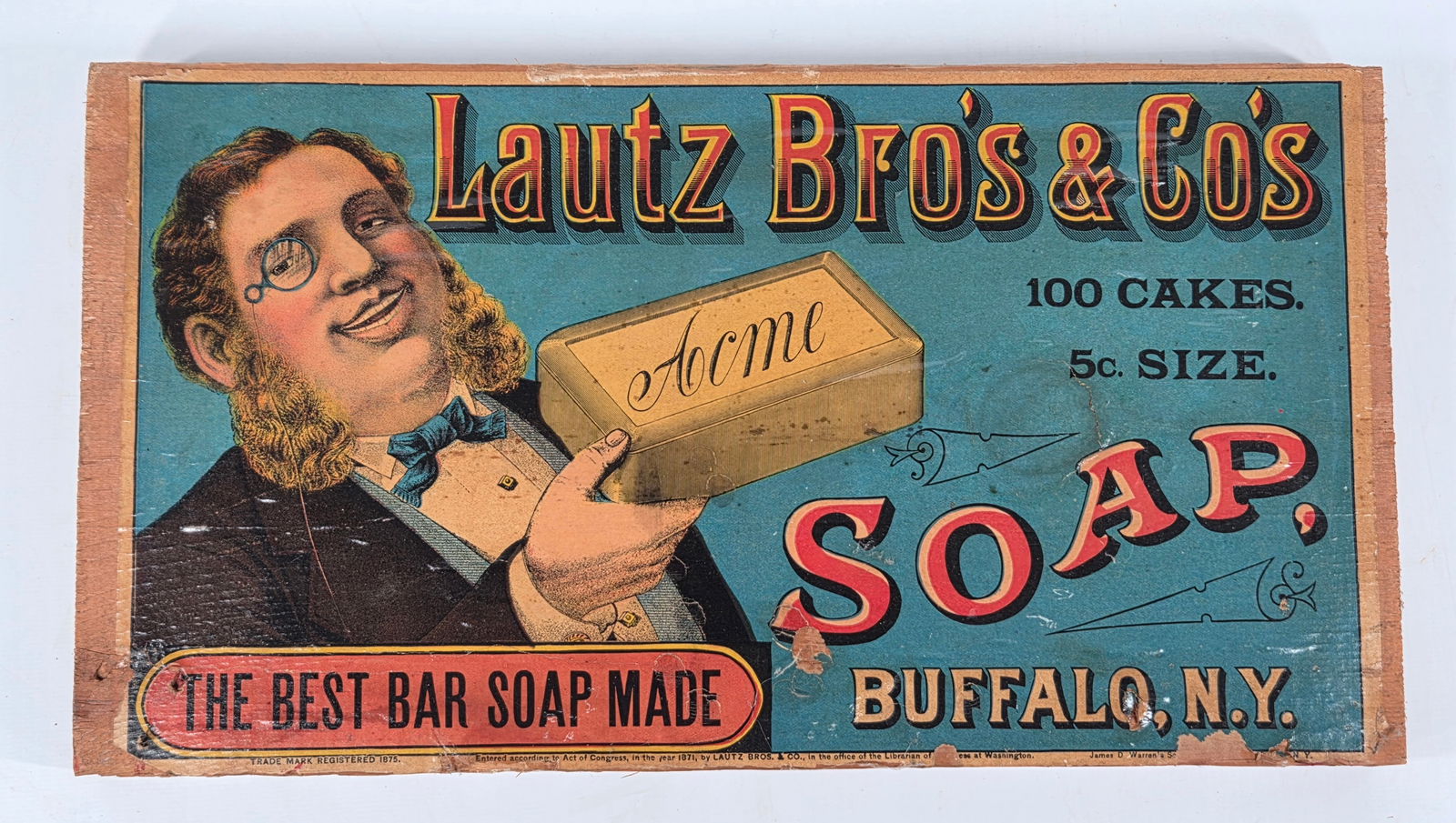 LAUTZ BROS & CO'S ACME SOAP BOX LID PANEL: PANEL ONLY REMAINS IN FAIR TO GOOD CONDITION, SHOWING SOME TYPICAL WEAR TO PAPER LABEL. BACK HAS BEEN PAINTED RED.