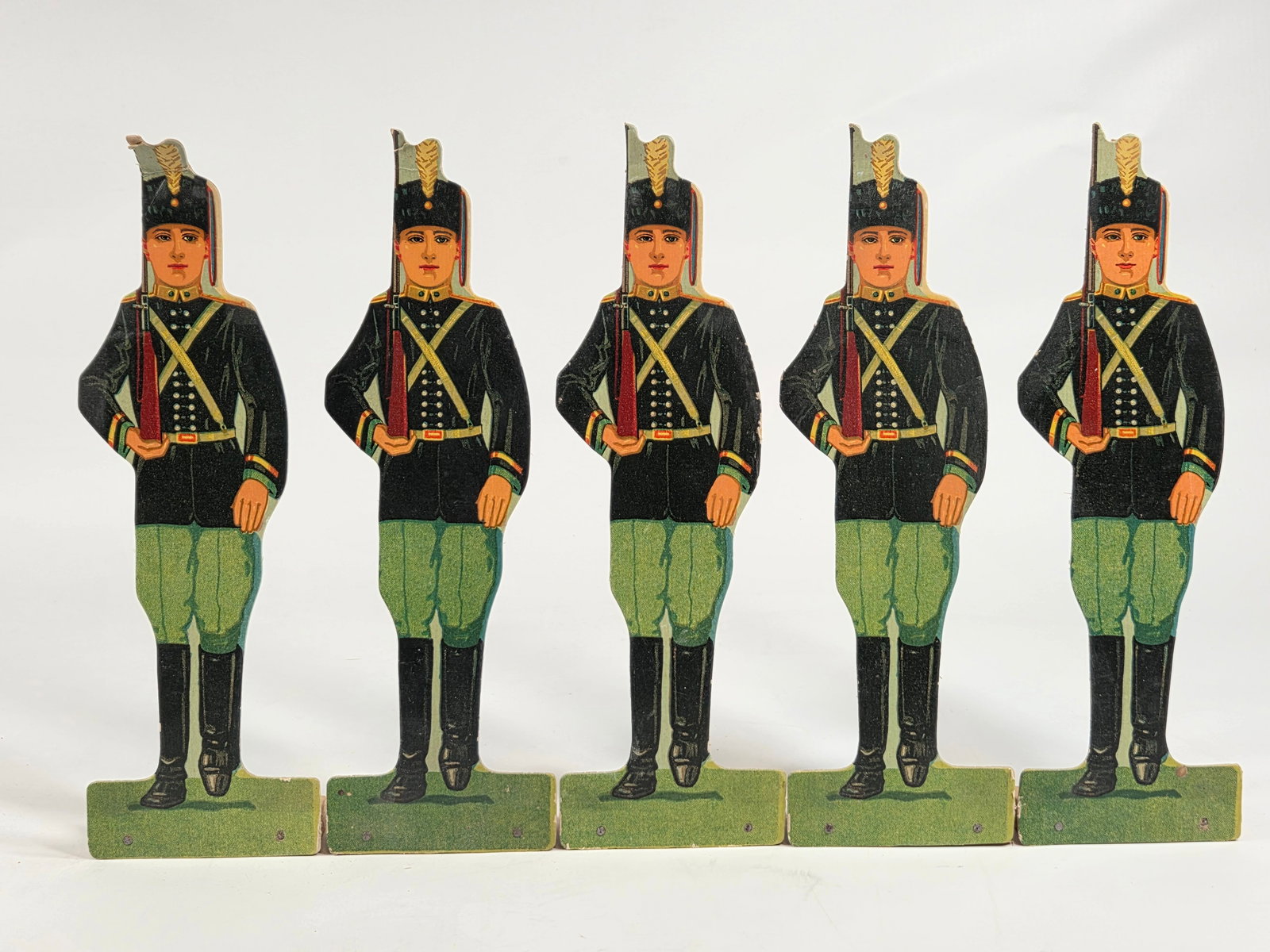 VARIOUS McLOUGHLIN CARDBOARD SOLDIER GAME PIECES: ALL REMAIN IN FAIR TO GOOD CONDITION, SOME SHOWING MORE WEAR THAN OTHERS.