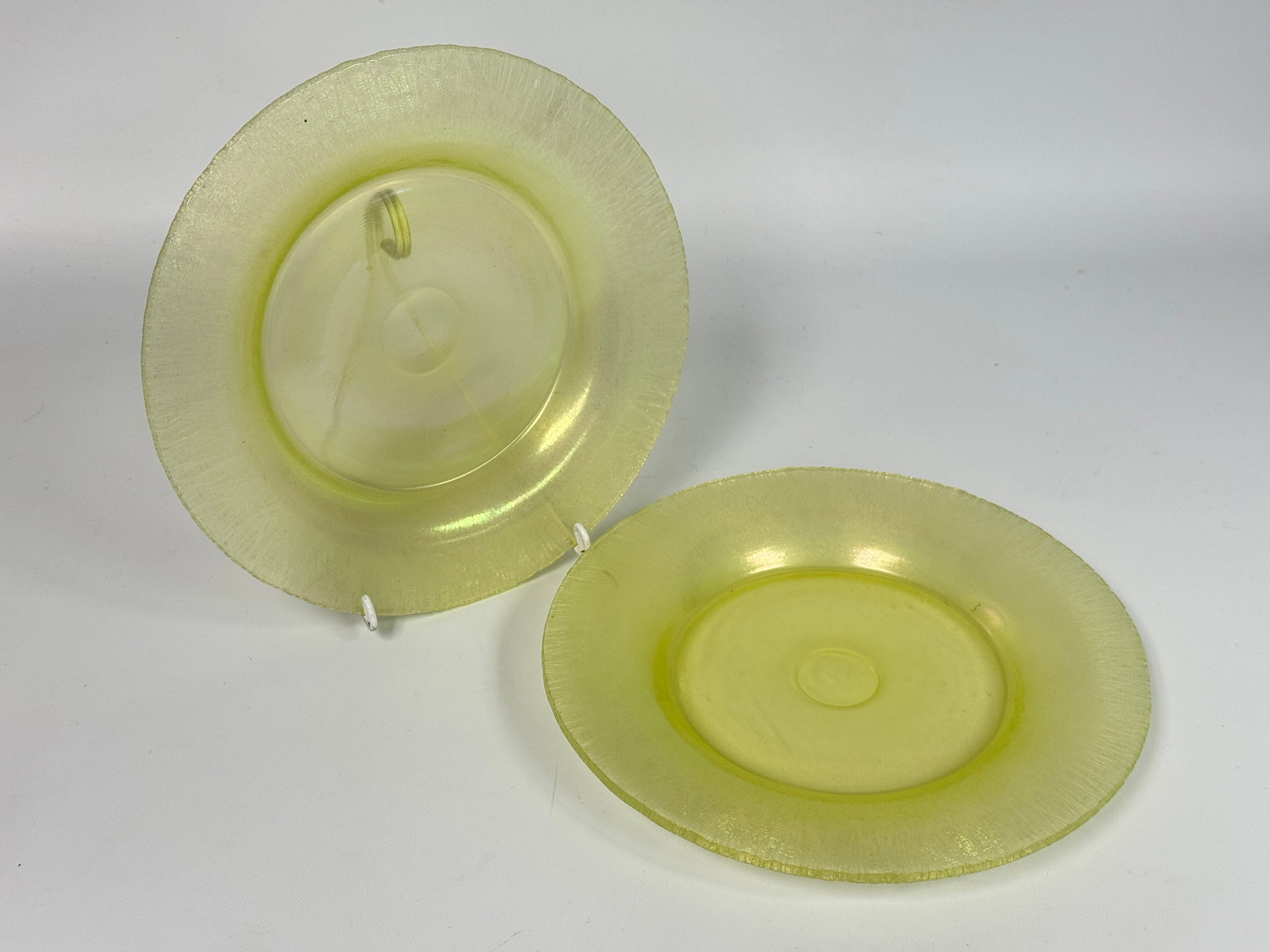 URANIUM GLASS GREEN IRIDESCENT PLATES: BOTH REMAIN IN GOOD CONDITION, NO CHIPS OR CRACKS.