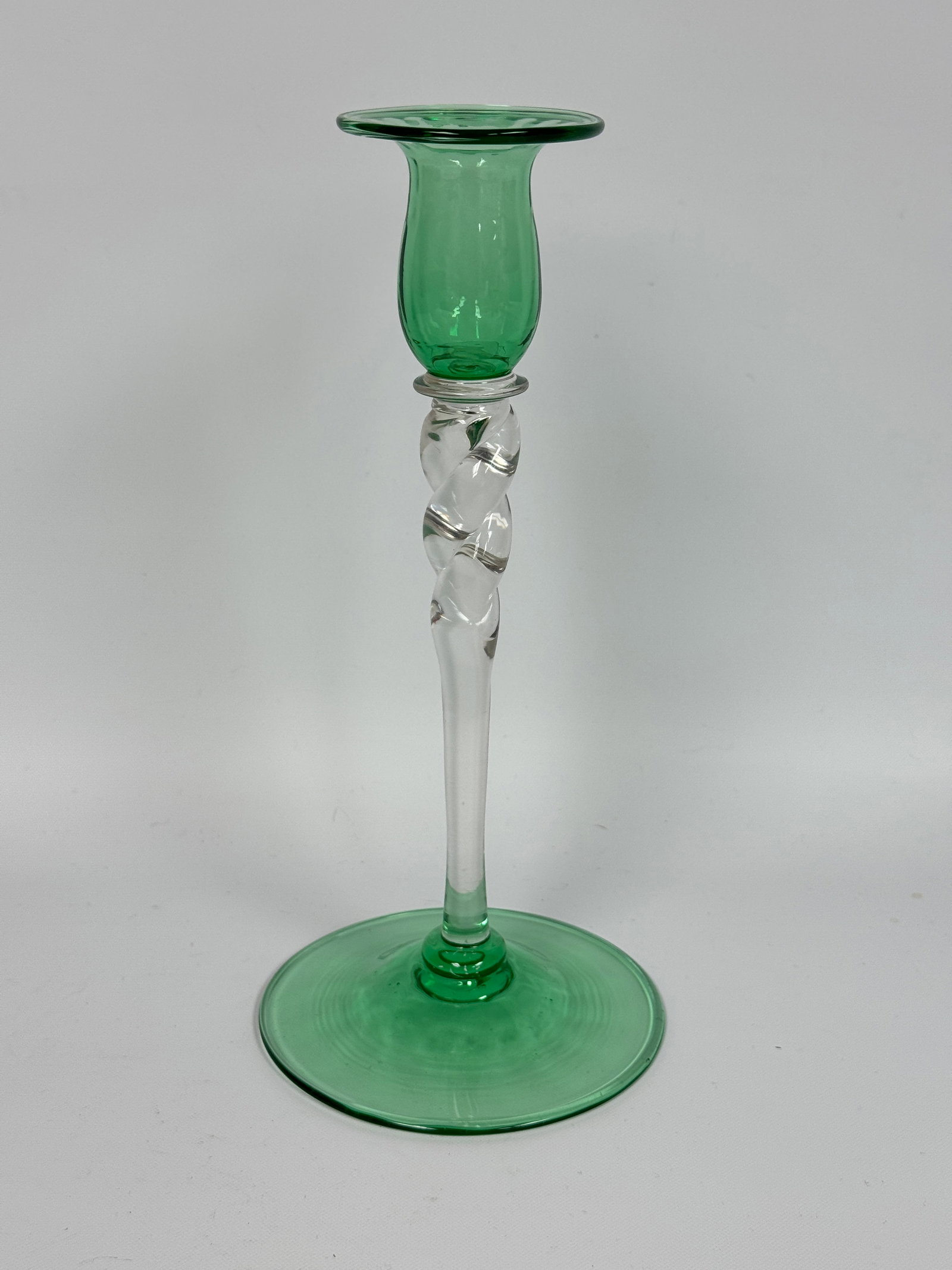 SIGNED STEUBEN CARDER GREEN TWISTED STEM CANDLESTICK: REMAINS IN VERY GOOD CONDITION, NO CHIPS OR CRACKS.