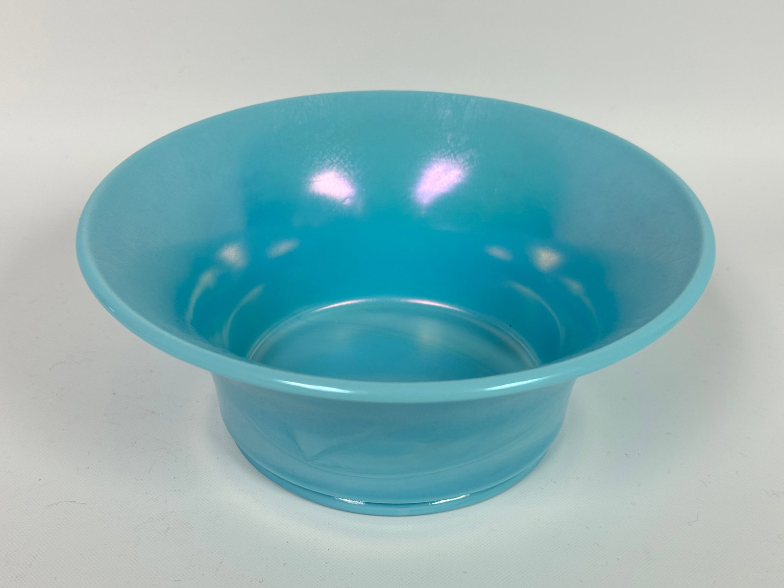 LT BLUE IRIDESCENT SLAG GLASS CONSOLE BOWL: REMAINS IN VERY GOOD CONDITION, NO CHIPS OR CRACKS.