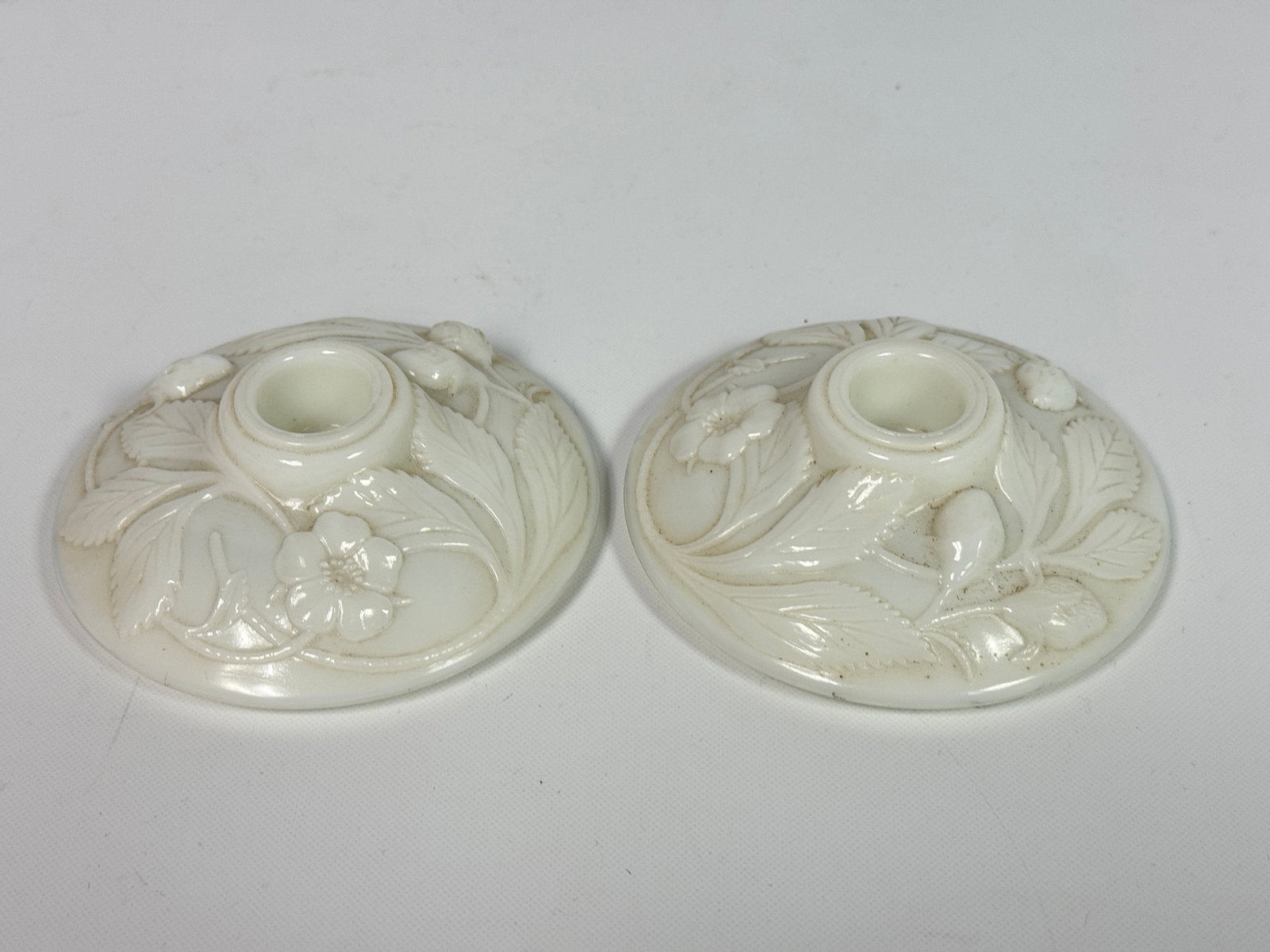 PAIR OF OPALESCENT GLASS STRAWBERRY CANDLESTICKS: BOTH REMAIN IN GOOD CONDITION, NO CHIPS OR CRACKS. DIRTY, NEEDING CLEANED.