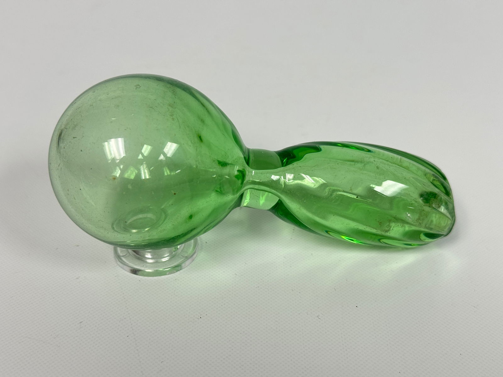 ANTIQUE HAND BLOWN GREEN GLASS SOCK DARNER: REMAINS IN GOOD CONDITION, SHOWING SOME TYPICAL WEAR. NO CHIPS OR CRACKS.