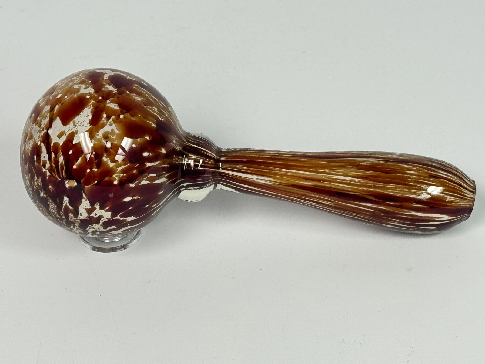 ANTIQUE BROWN SPLATTER END OF DAY GLASS SOCK DARNER: REMAINS IN GOOD CONDITION, SHOWING SOME TYPICAL WEAR. NO CHIPS OR CRACKS.