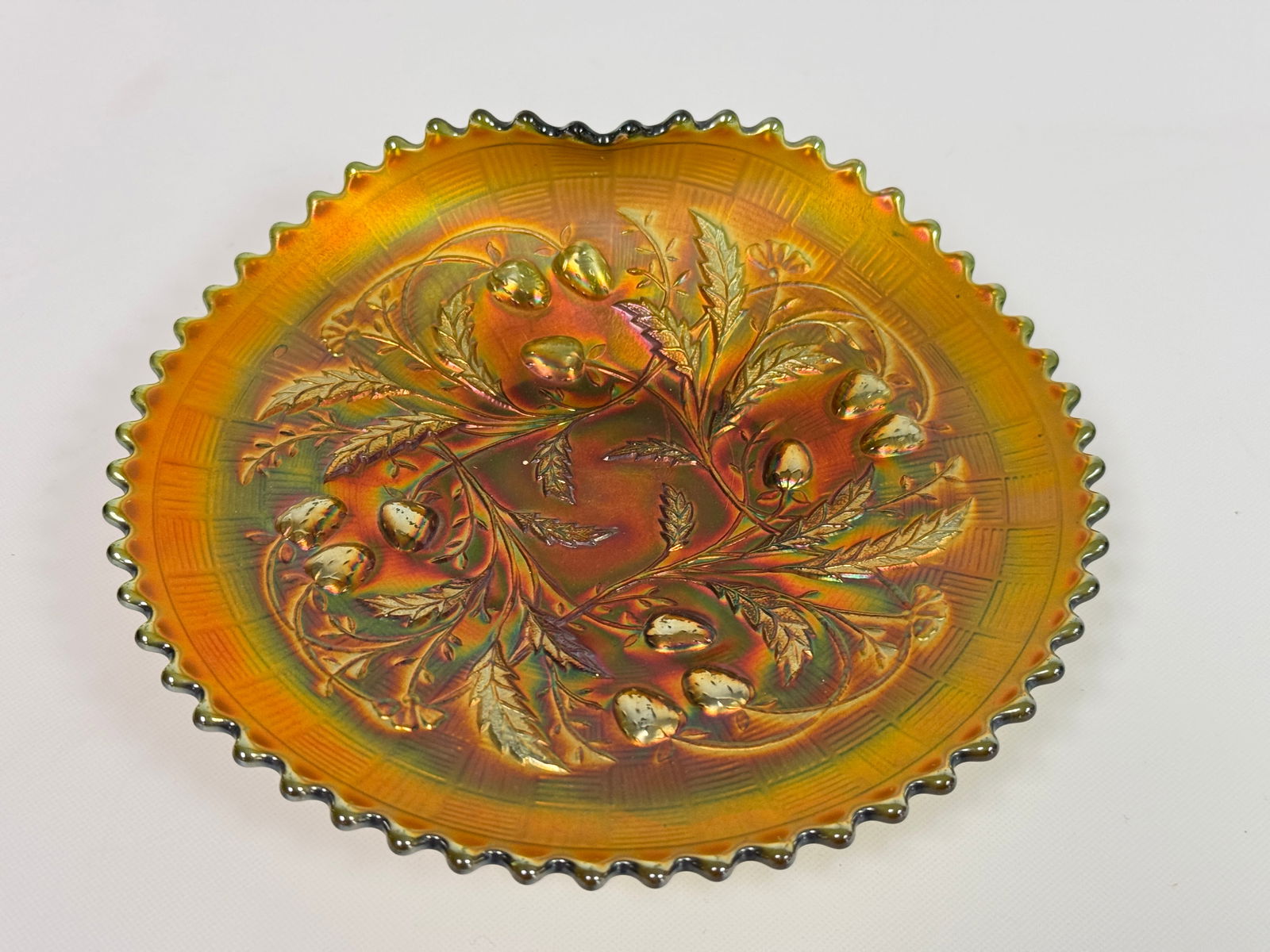 NORTHWOOD MARIGOLD CARNIVAL GLASS STRAWBERRY DISH: REMAINS IN VERY GOOD CONDITION, NO CHIPS OR CRACKS.