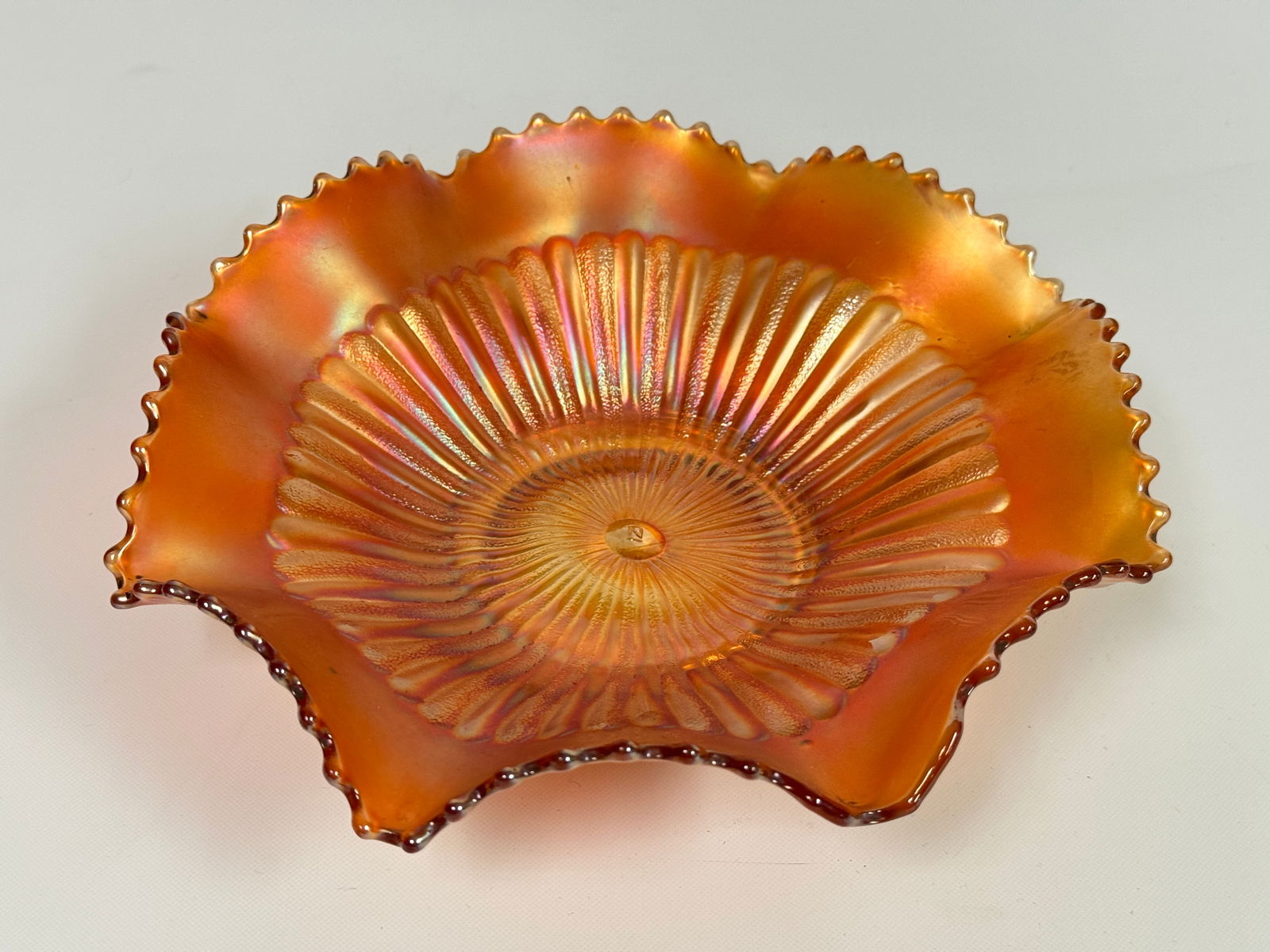 NORTHWOOD MARIGOLD CARNIVAL GLASS SCALLOPED BOWL: REMAINS IN VERY GOOD CONDITION, NO CHIPS OR CRACKS.