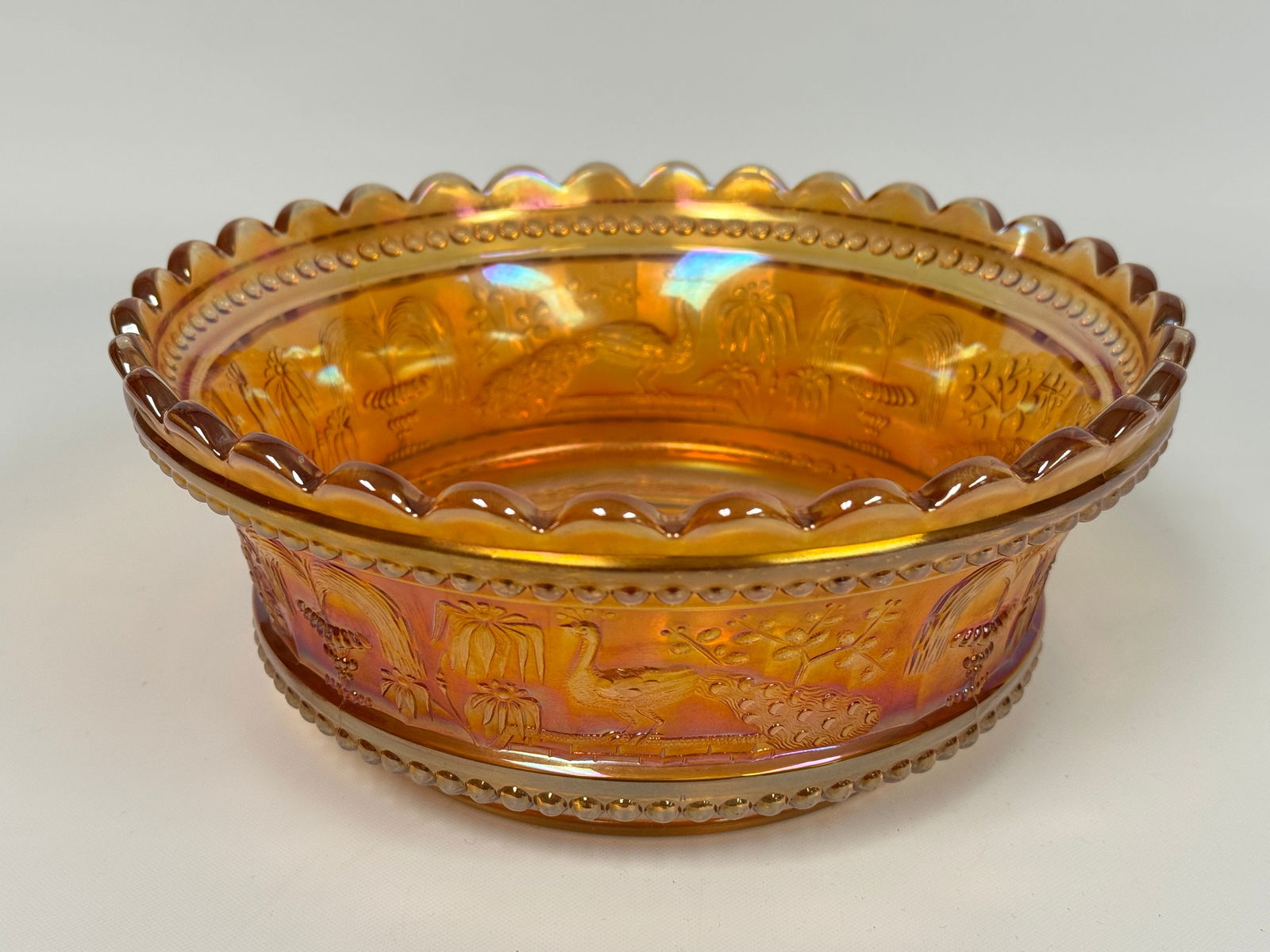 NORTHWOOD PEACOCK AT FOUNTAIN CARNIVAL GLASS MASTER BERRY BOWL: REMAINS IN VERY GOOD CONDITION, NO CHIPS OR CRACKS.