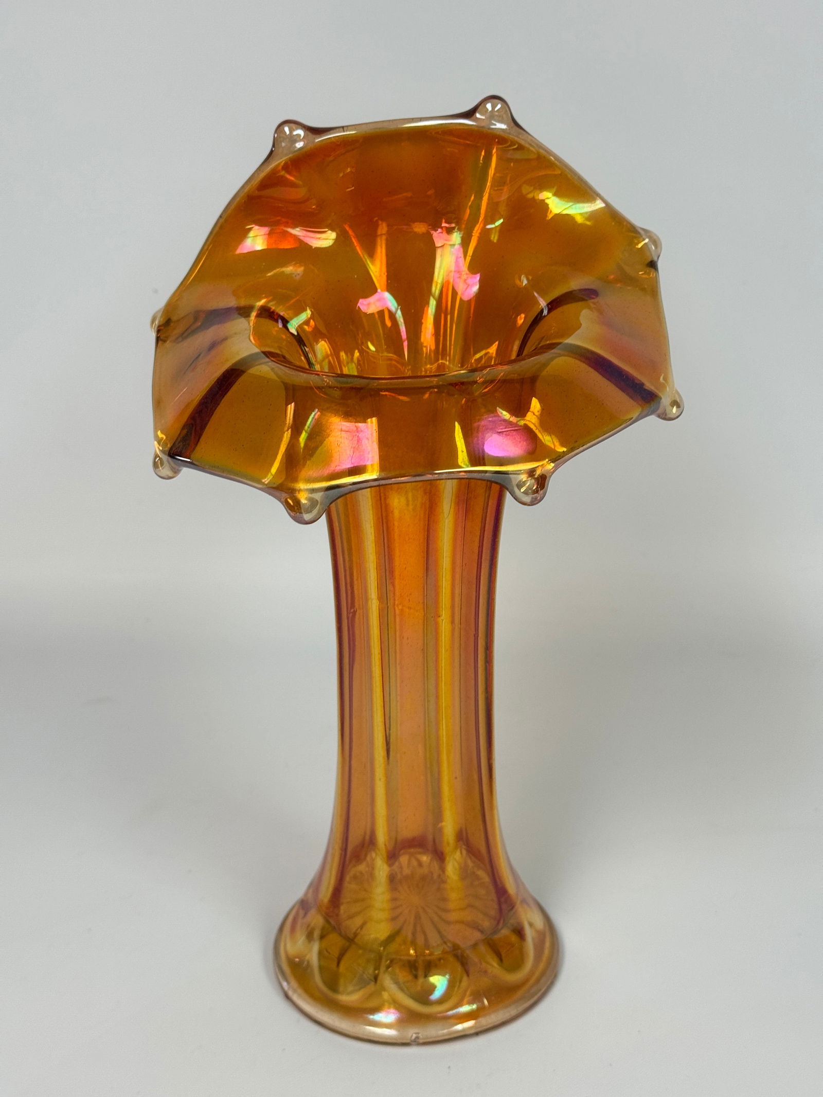 MARIGOLD CARNIVAL GLASS JACK IN THE PULPIT VASE: REMAINS IN VERY GOOD CONDITION, NO CHIPS OR CRACKS.