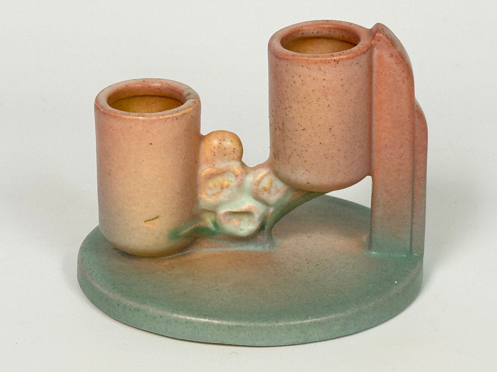 ROSEVILLE ART POTTERY PINK IXIA DOUBLE CANDLE HOLDER: REMAINS IN GOOD CONDITION, NO CHIPS OR CRACKS.
