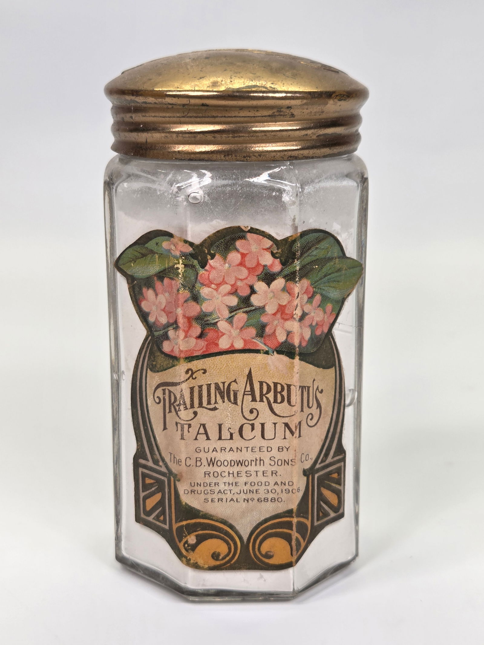 C.B. WOODWORTH SONS. TRAILER ARBUTUS TALKCUM JAR: REMAINS IN GOOD CONDITION WITH ORIGINAL LABEL.