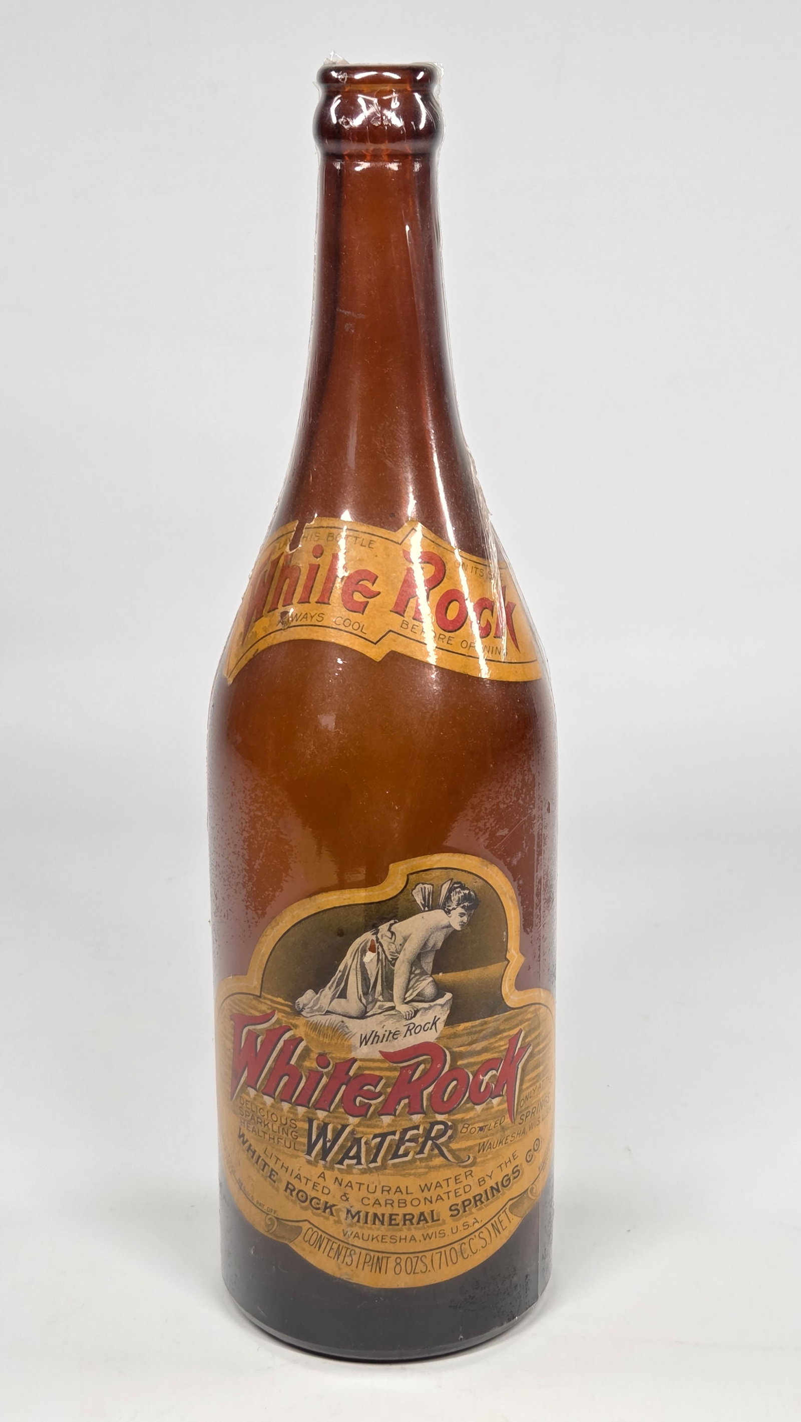ANTIQUE WHITE ROCK WATER PAPER LABEL W/ BOTTLE: LABELS REMAIN IN GOOD CONDITION, SHOWING SOME LIGHT WEAR. BOTTLE PLASTIC WRAPPED.