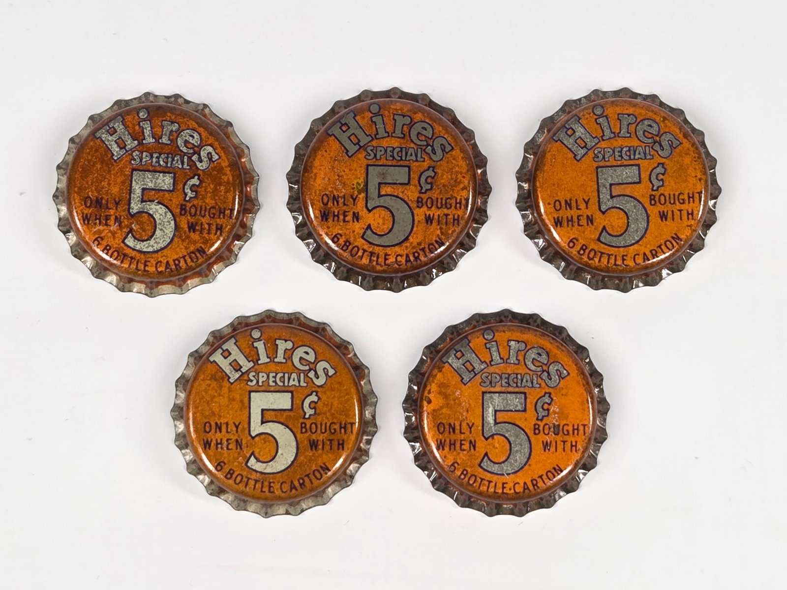 5) HIRES SPECIAL 5 CENT BOTTLE CAPS: ALL REMAIN IN GOOD CONDITION, SHOWING SOME TYPICAL WEAR.