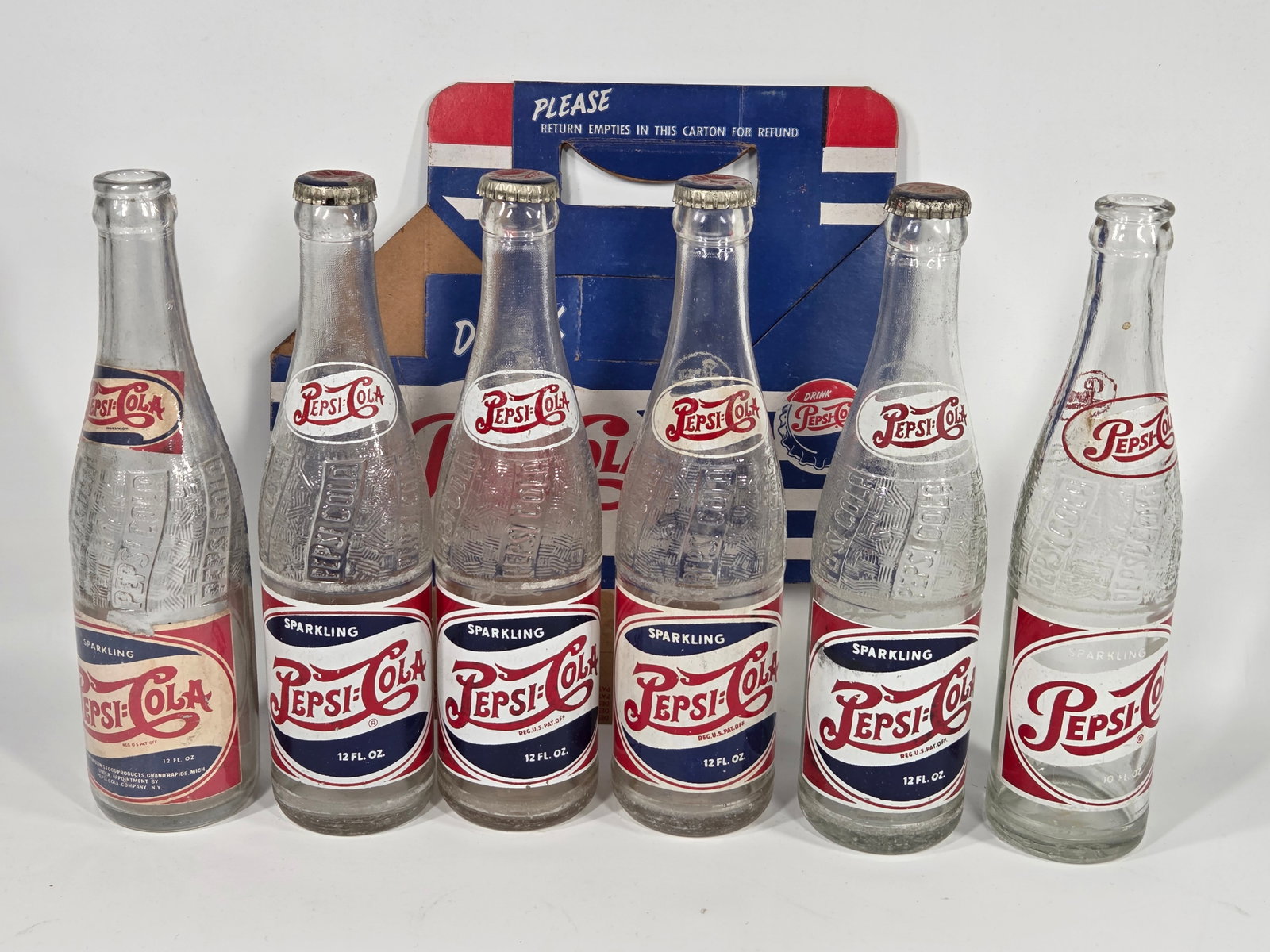 6) VARIOUS PEPSI COLA BOTTLES W/ CARRIER (1 of 6)