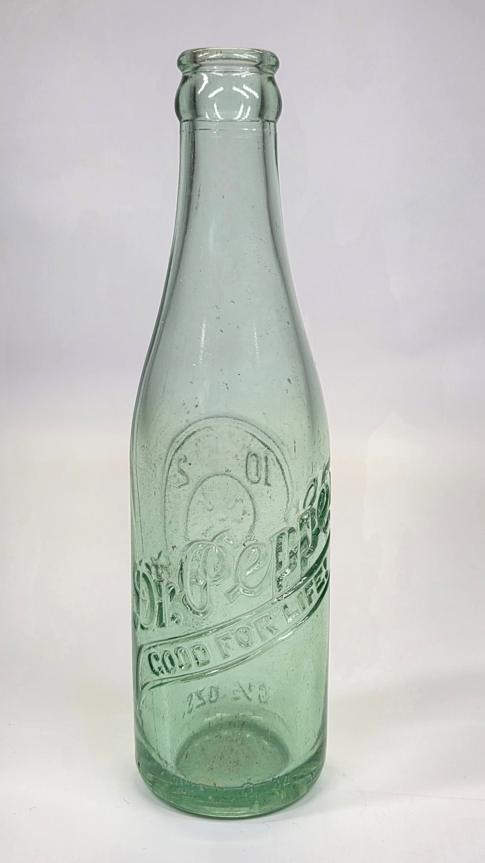 DR. PEPPER ROANOKE VA GLASS BOTTLE: REMAINS IN GOOD CONDITION, NO CHIPS OR CRACKS.