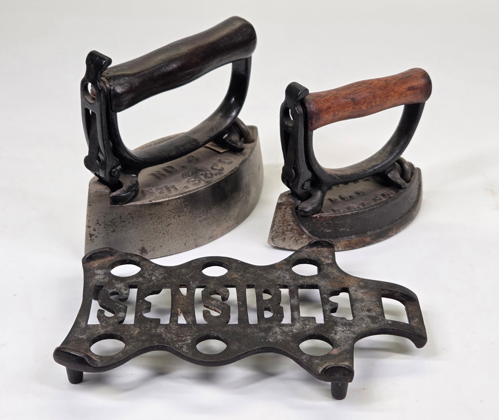 ANTIQUE SENSIBLE SAD IRONS & TRIVET (1 of 6)