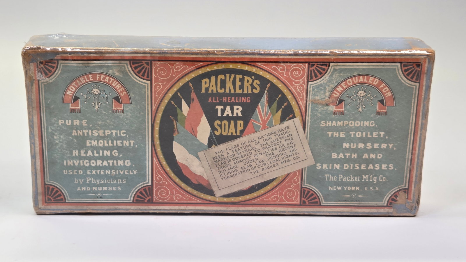 PACKER'S TAR SOAP ADVERTISING BOX: REMAINS IN GOOD CONDITION, SHOWING EDGE WEAR. PLASTIC WRAPPED FOR DISPLAY