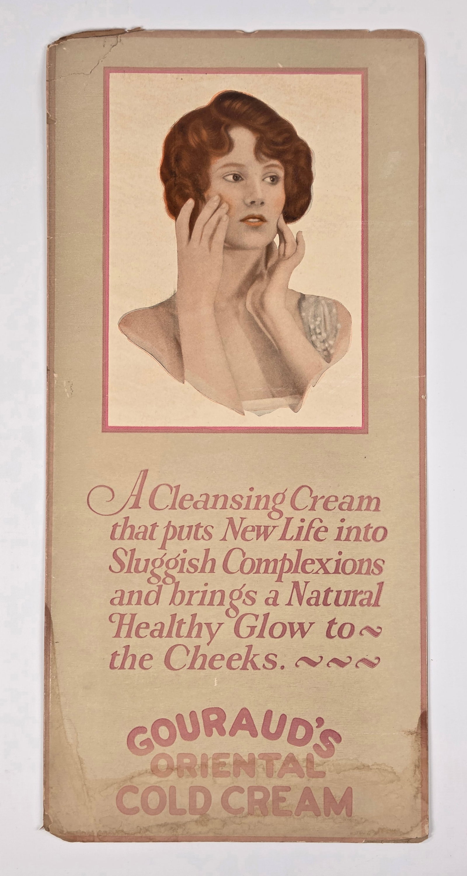 GOURAUD ORIENTAL GOLD CREAM CARDBOARD SIGN: REMAINS IN FAIR CONDITION, SHOWING WEAR TO EDGES. BOTTOM EDGE SHOWING WATER STAINING.