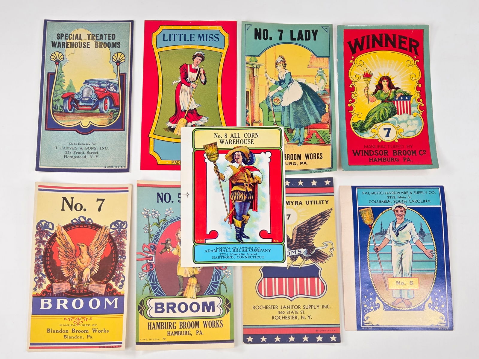 9) VARIOUS ADVERTISING BROOM LABELS: ALL REMAIN IN VERY GOOD UNUSED CONDITION.