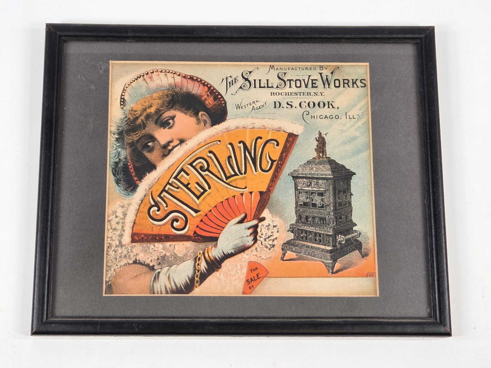 THE SILL STOVE WORKS. STERLING TRADE SIGN: REMAINS IN GOOD CONDITION, SHOWING SOME LIGHT STAINING. NICELY MATTED AND FRAMED.