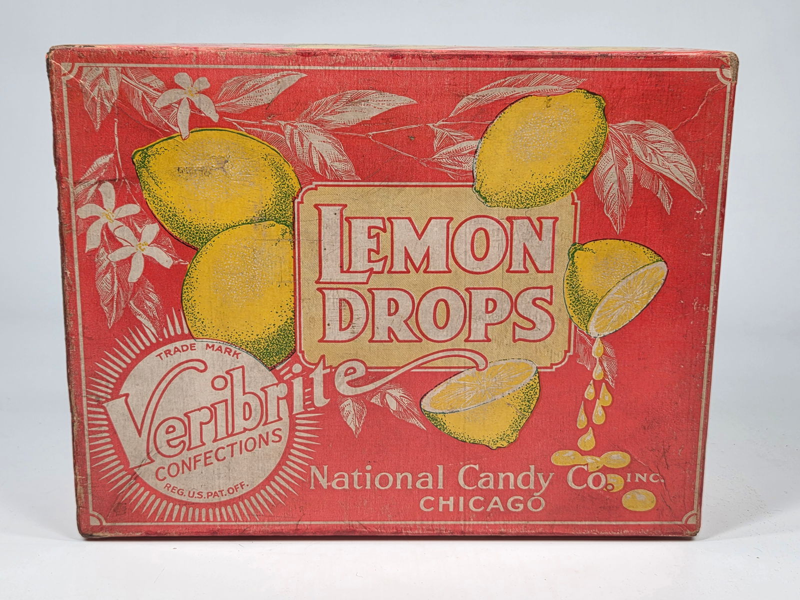 NATIONAL CANDY CO. VERIBRITE LEMON DROPS ADVERTISING BOX: EMPTY BOX REMAINS IN GOOD CONDITION, SHOWING SOME TYPICAL WEAR.
