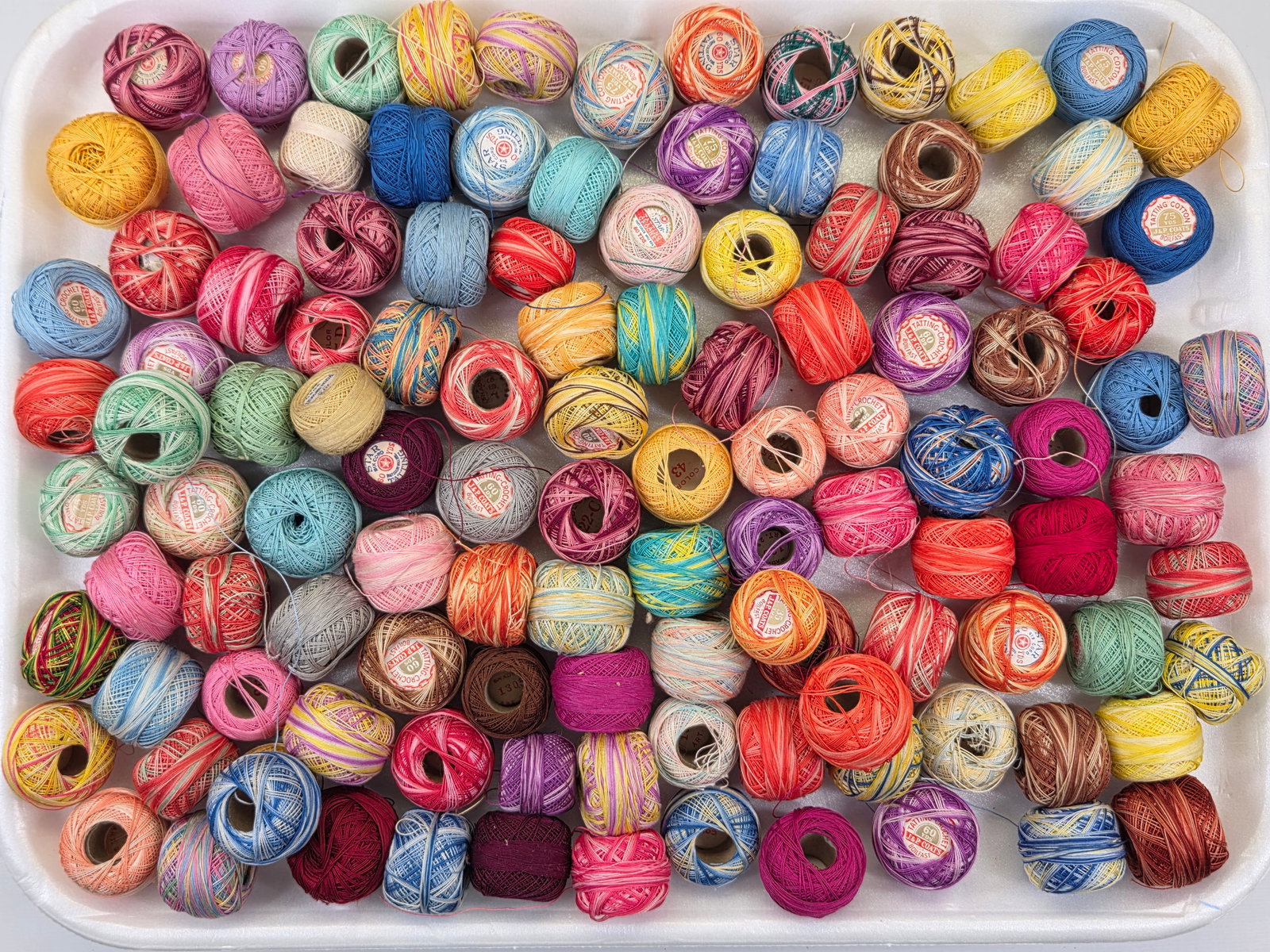 ASSORTMENT OF VARIOUS UNUSED SEWING THREAD: ALL REMAIN IN VERY GOOD UNUSED CONDITION. 60+ PIECES.