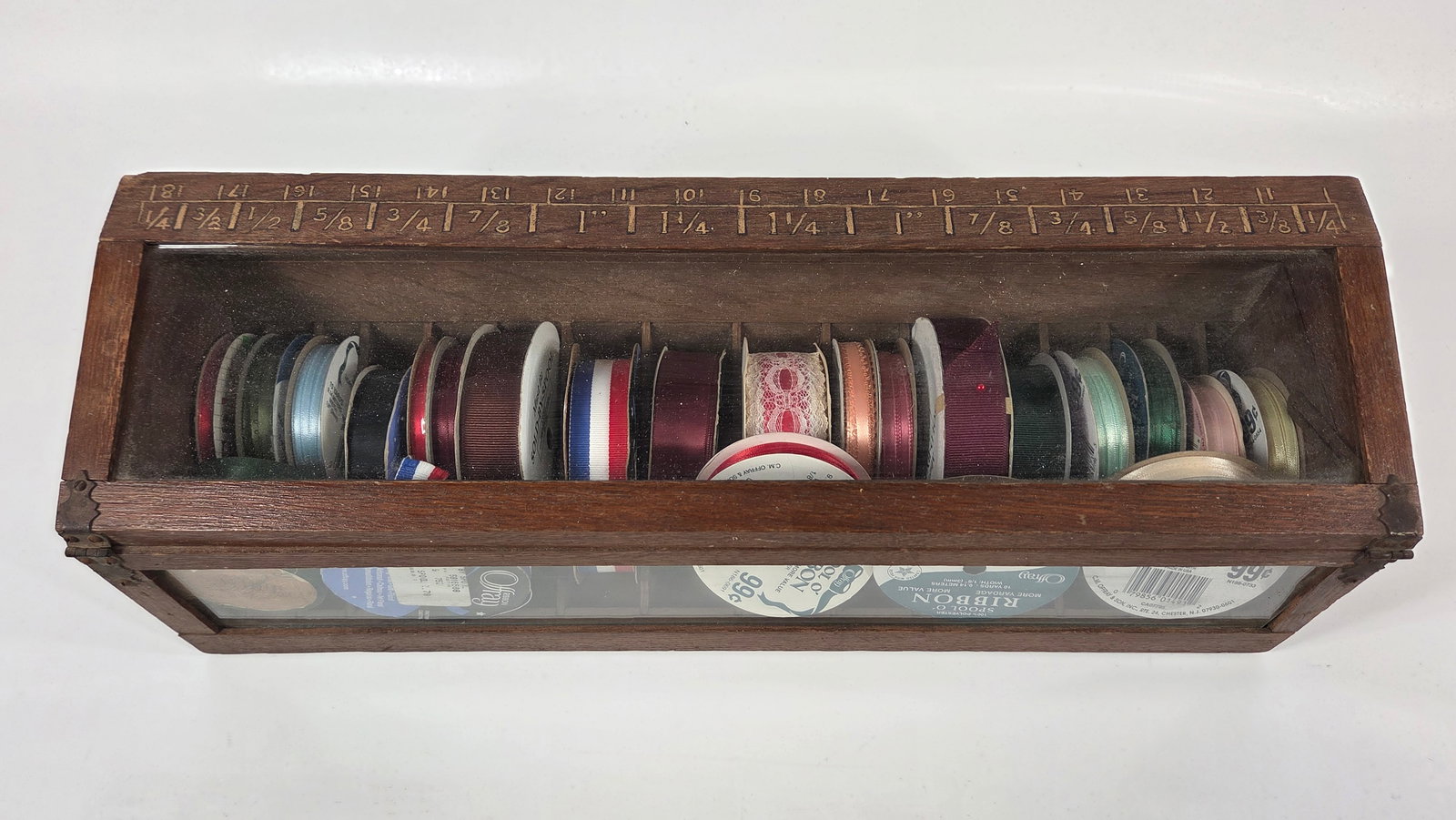 ANTIQUE COUNTRY STORE RIBBON STORE DISPLAY CASE: REMAINS IN GOOD CONDITION, SHOWING SOME TYPICAL WEAR CONSISTENT WITH USE AND AGE.