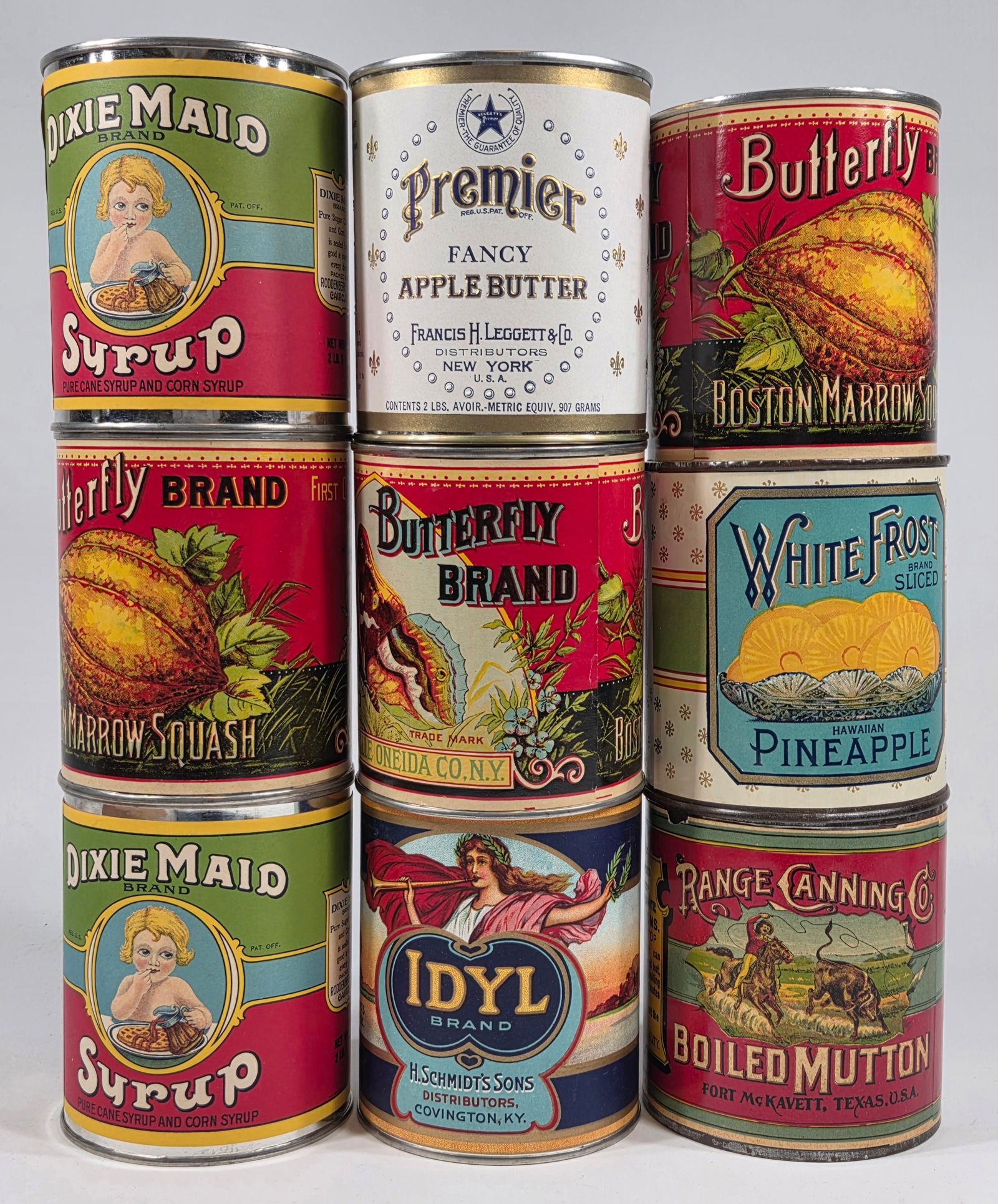 ASSORTMENT OF REPRODUCTION TINS W/ LABELS: ALL REPRODUCTIONS REPRODUCTIONS REMAIN IN VERY GOOD CONDITION.