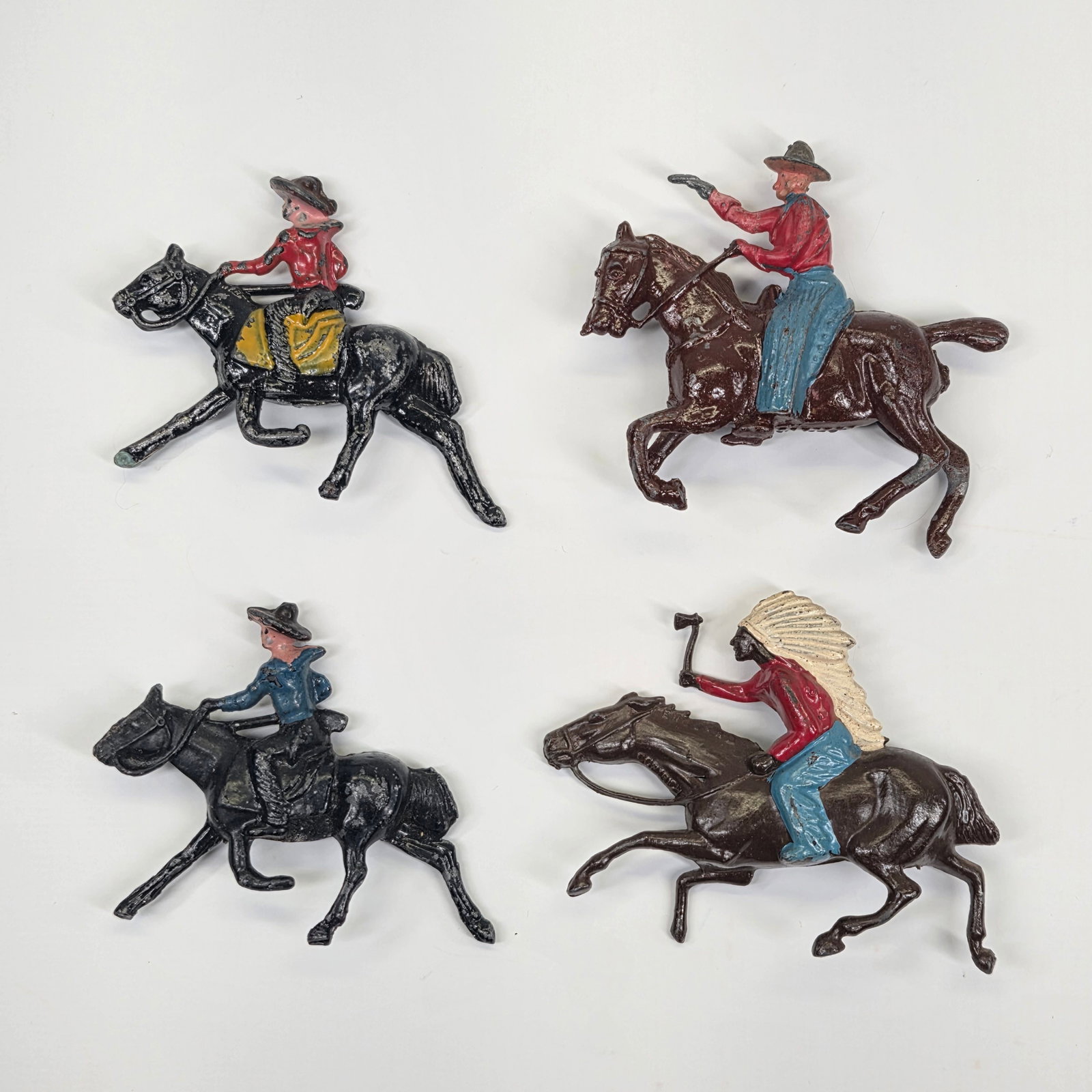 4) VINTAGE LEAD COWBOY & INDIAN ON HORSE: ALL REMAIN IN GOOD CONDITION, SHOWING SOME TYPICAL PAINT WEAR.
