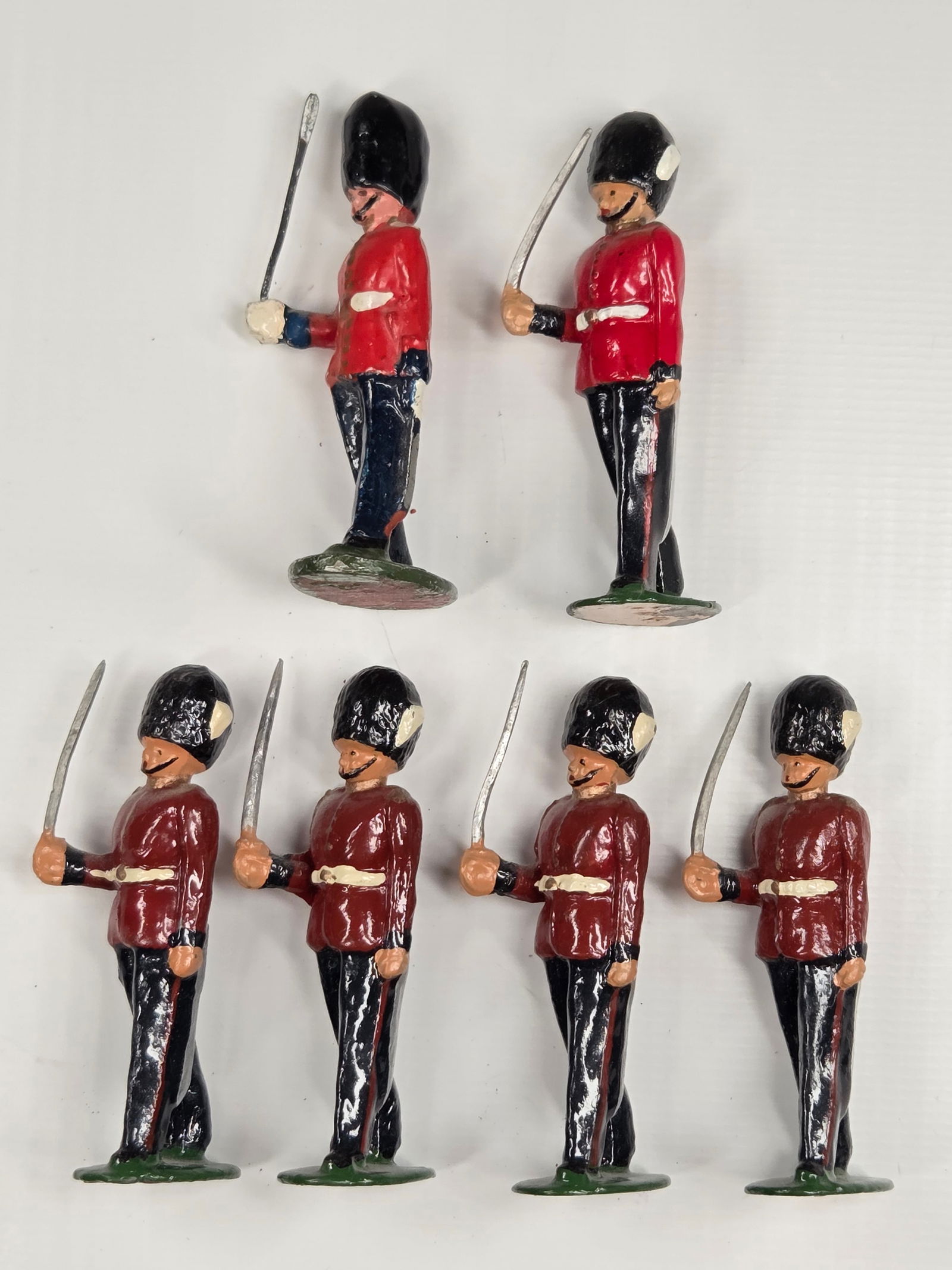 6) VINTAGE BRITAIN COLDSTREAM GUARDS REPAINT: 4 REMAIN IN VERY GOOD REPAINT CONDITION. 2 ORIGINAL, SHOWING PAINT WEAR.