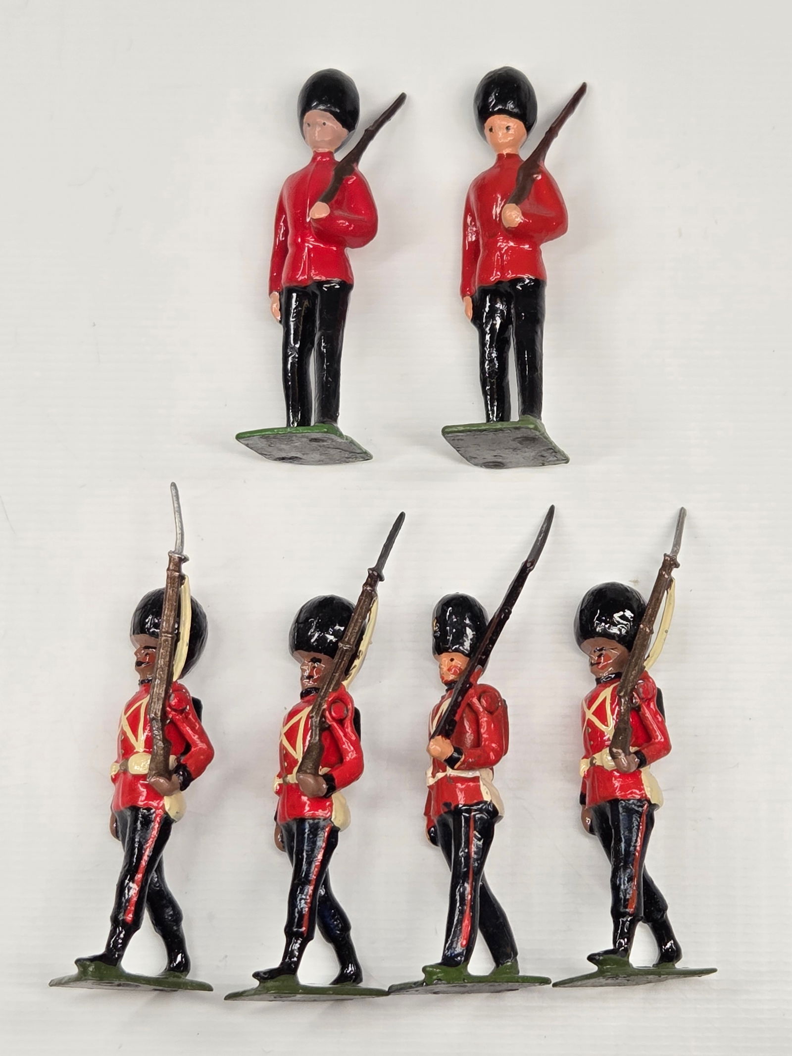 6) VARIOUS BRITAIN GUARDS: ALL REMAIN IN GOOD CONDITION, SHOWING SOME PAINT WEAR.